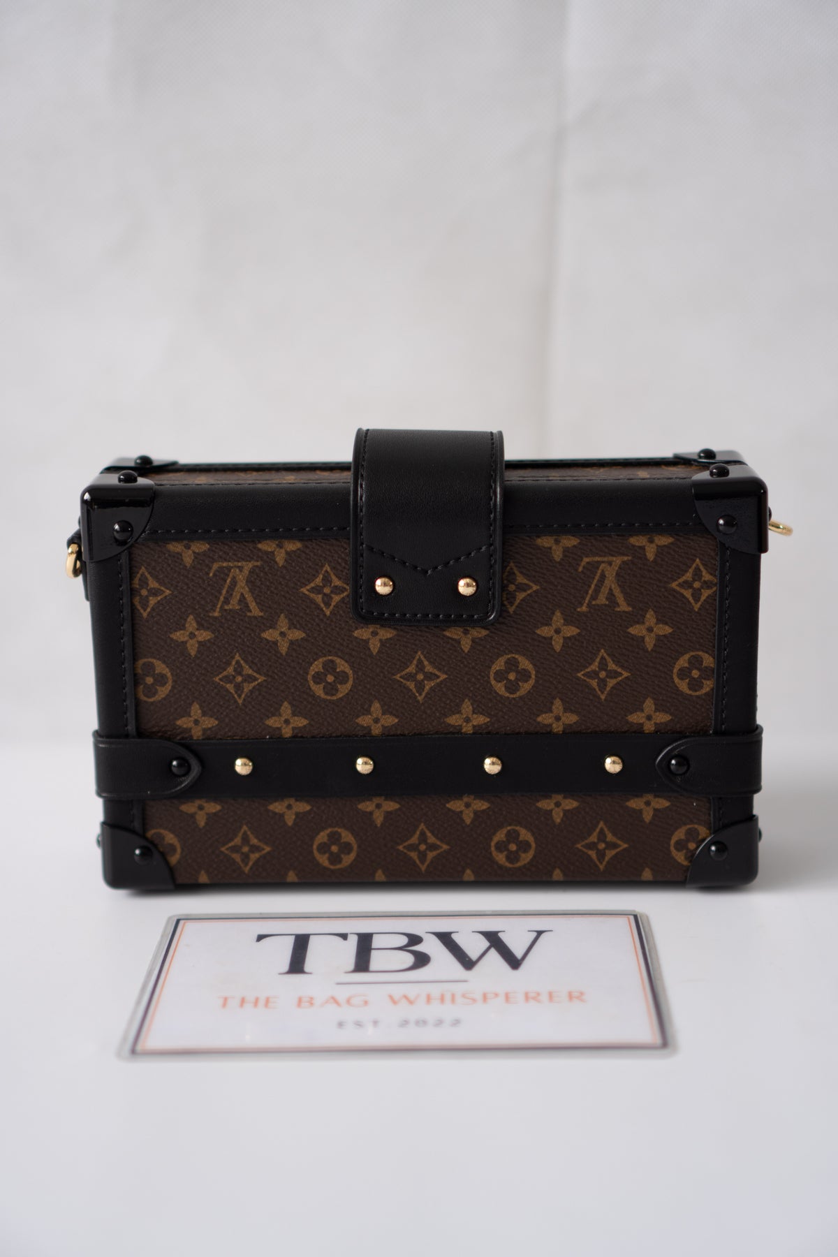 Petite Malle – Monogram Canvas with Black Calfskin & Gold-Tone Hardware