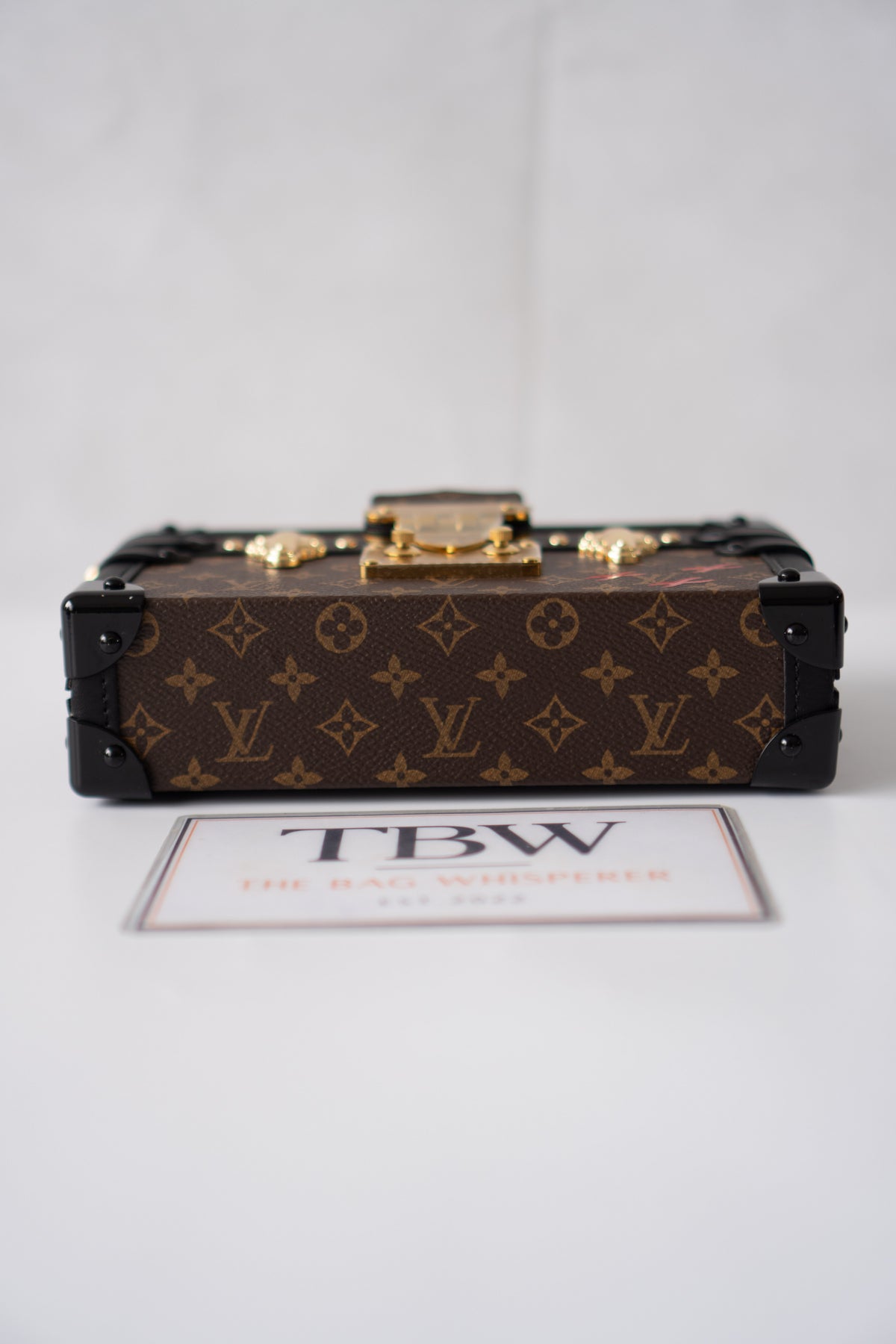 Petite Malle – Monogram Canvas with Black Calfskin & Gold-Tone Hardware