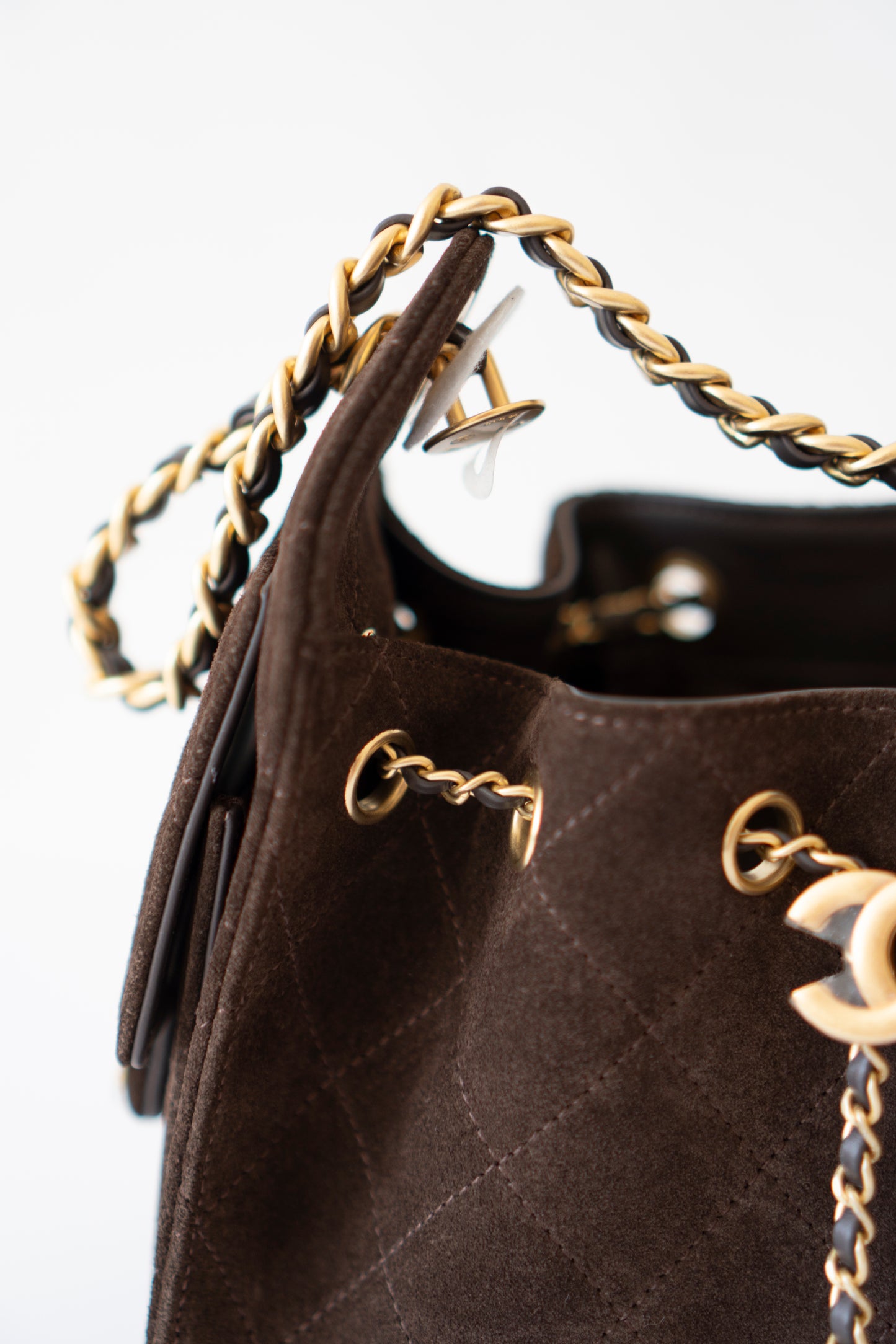 C25 Mini Drawstring Chain Bag – Dark Brown Suede with Gold Hardware