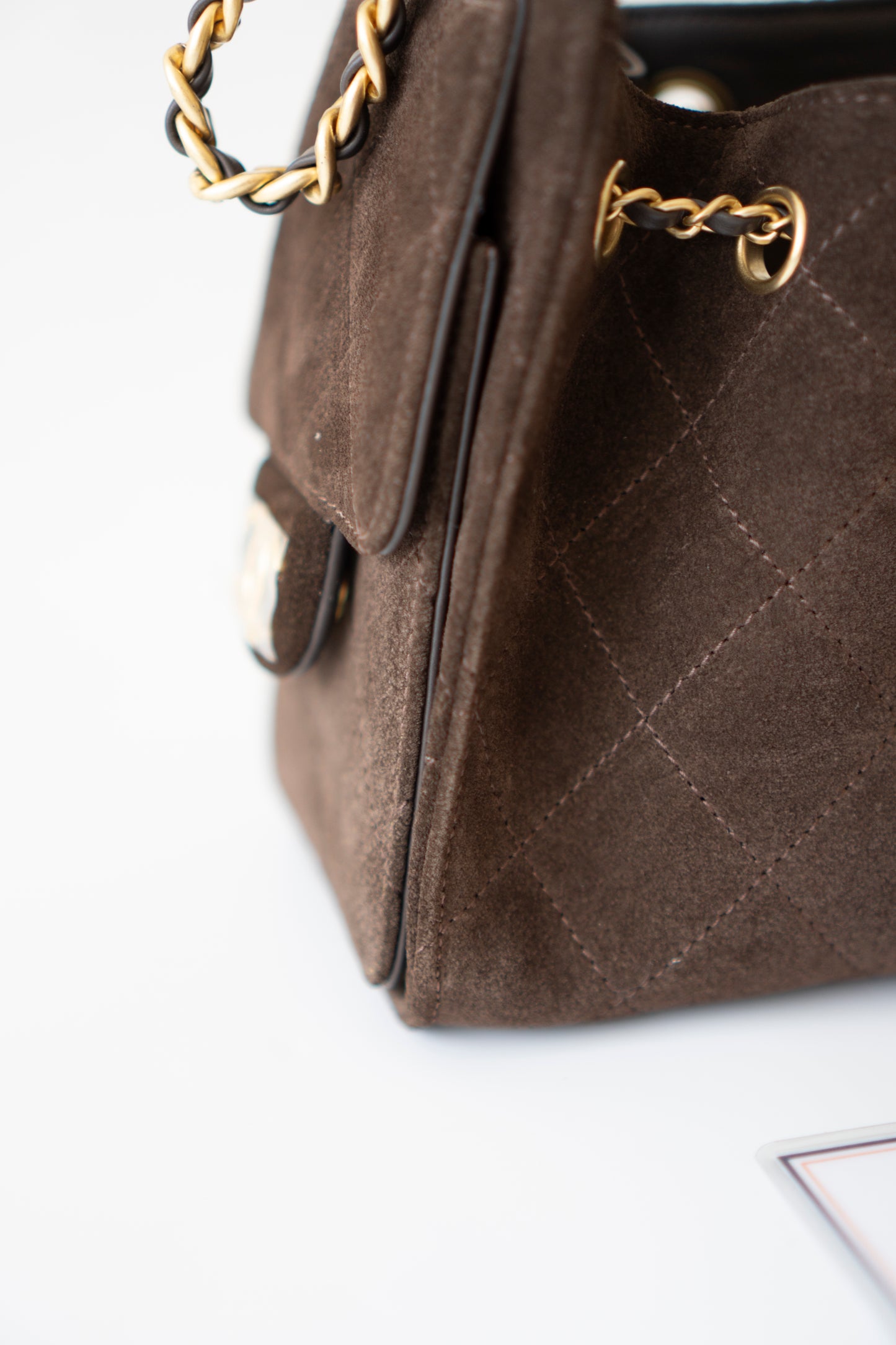 C25 Mini Drawstring Chain Bag – Dark Brown Suede with Gold Hardware