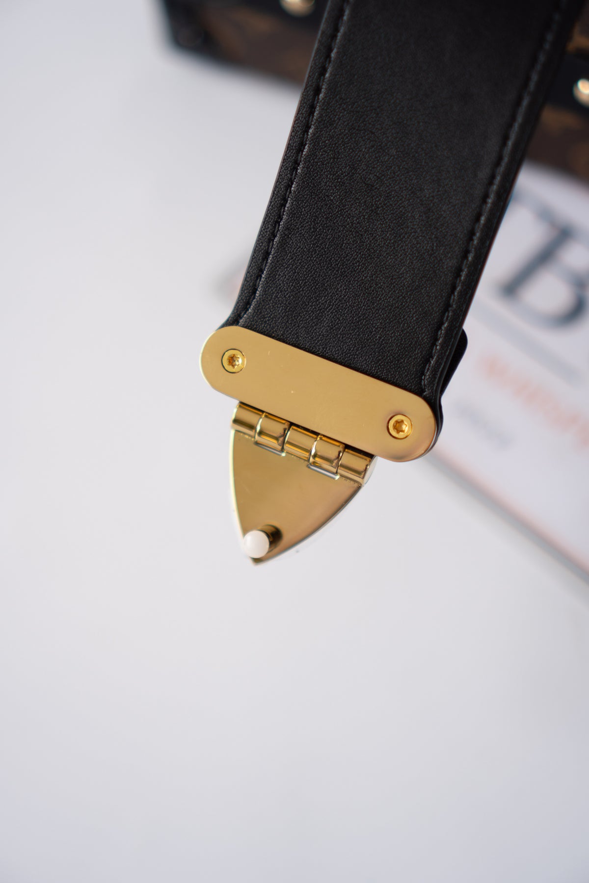 Petite Malle – Monogram Canvas with Black Calfskin & Gold-Tone Hardware