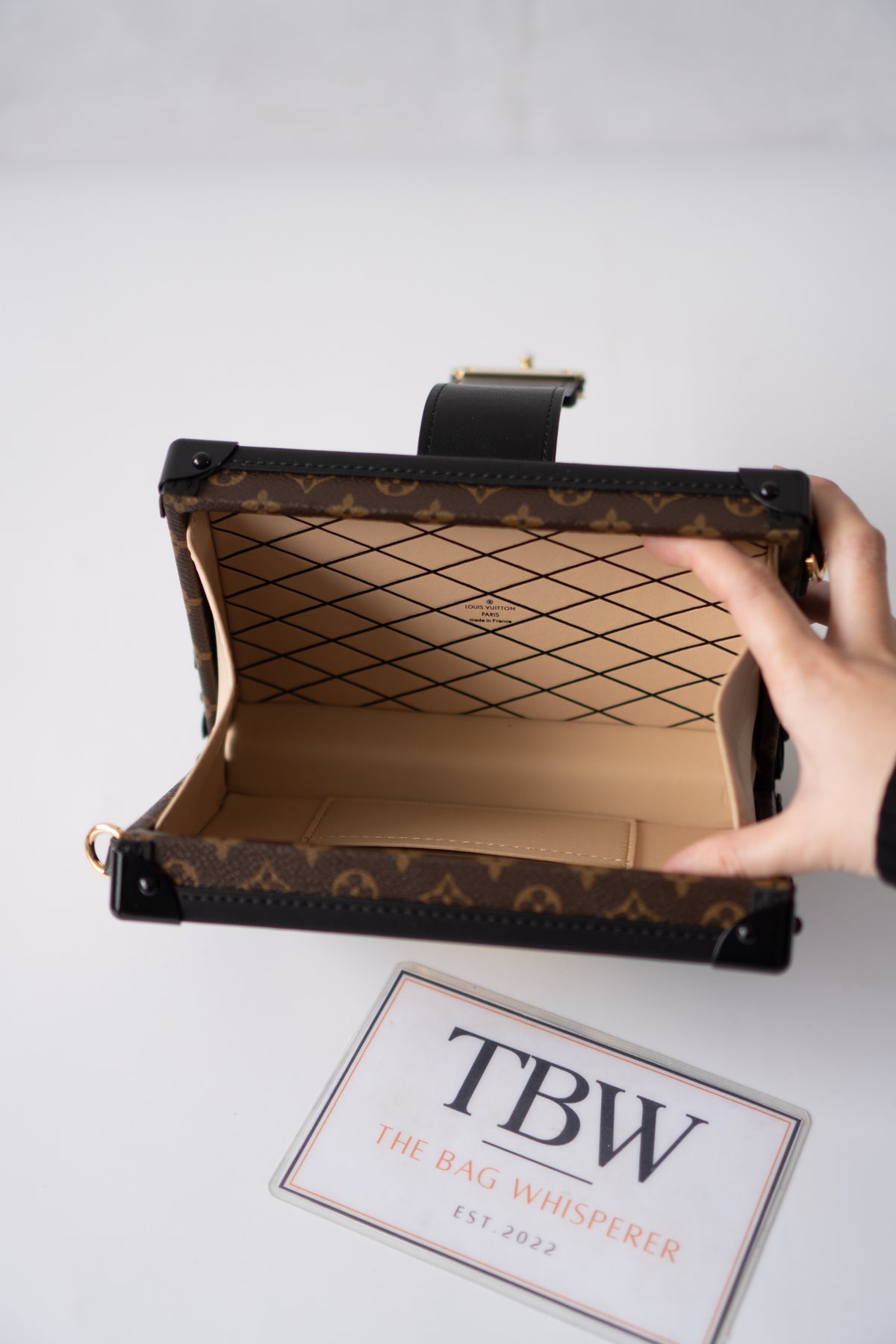 Petite Malle – Monogram Canvas with Black Calfskin & Gold-Tone Hardware