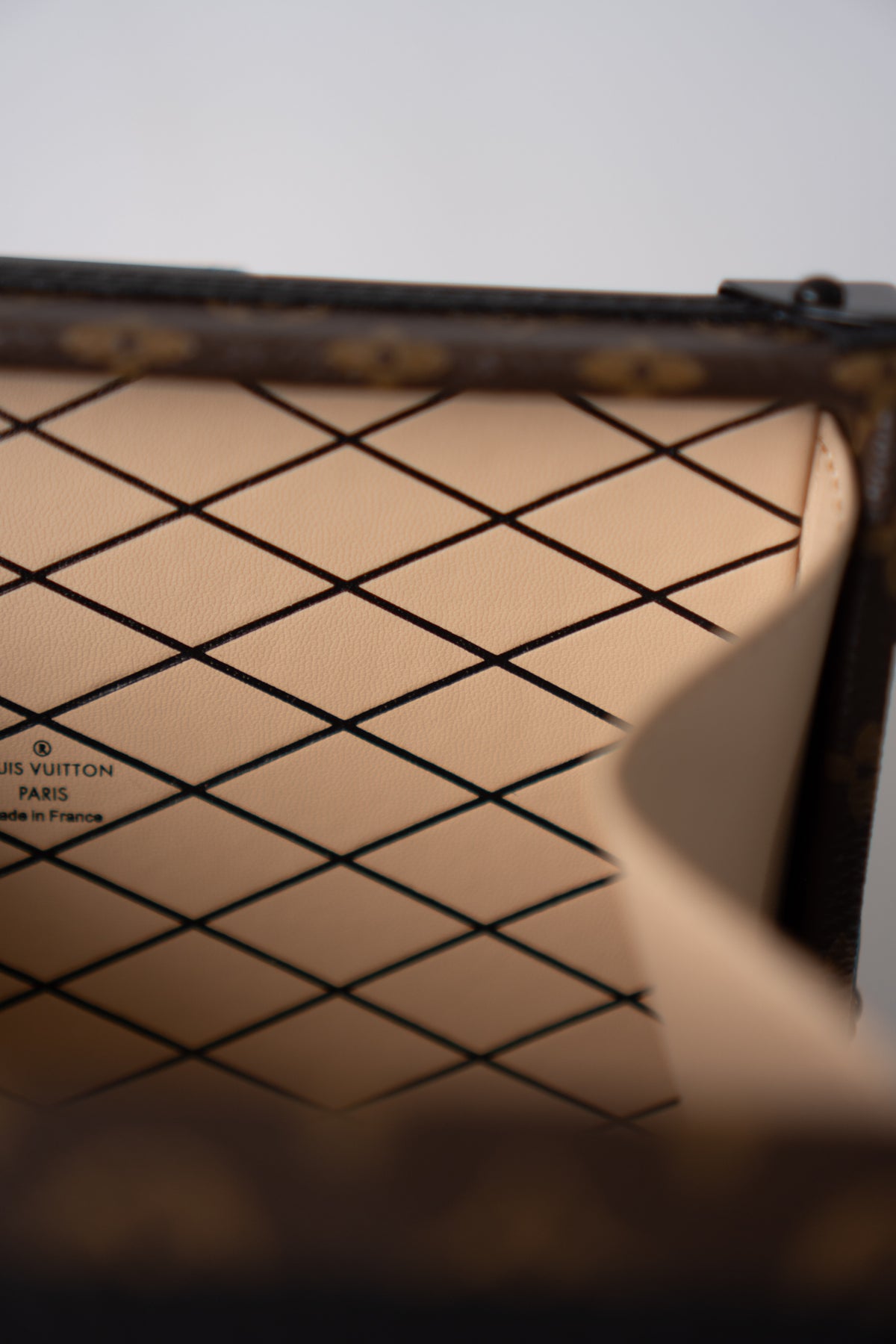 Petite Malle – Monogram Canvas with Black Calfskin & Gold-Tone Hardware