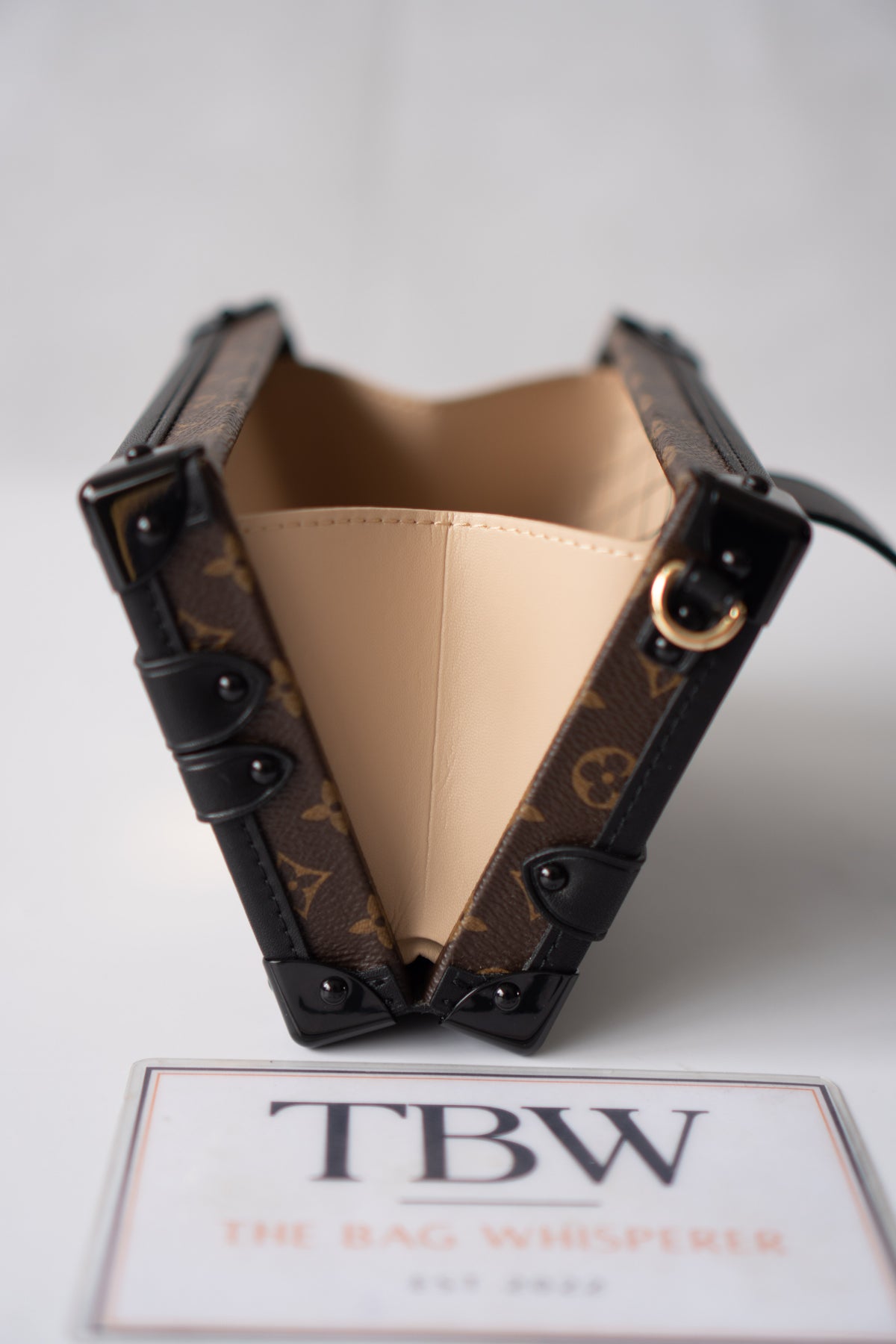 Petite Malle – Monogram Canvas with Black Calfskin & Gold-Tone Hardware