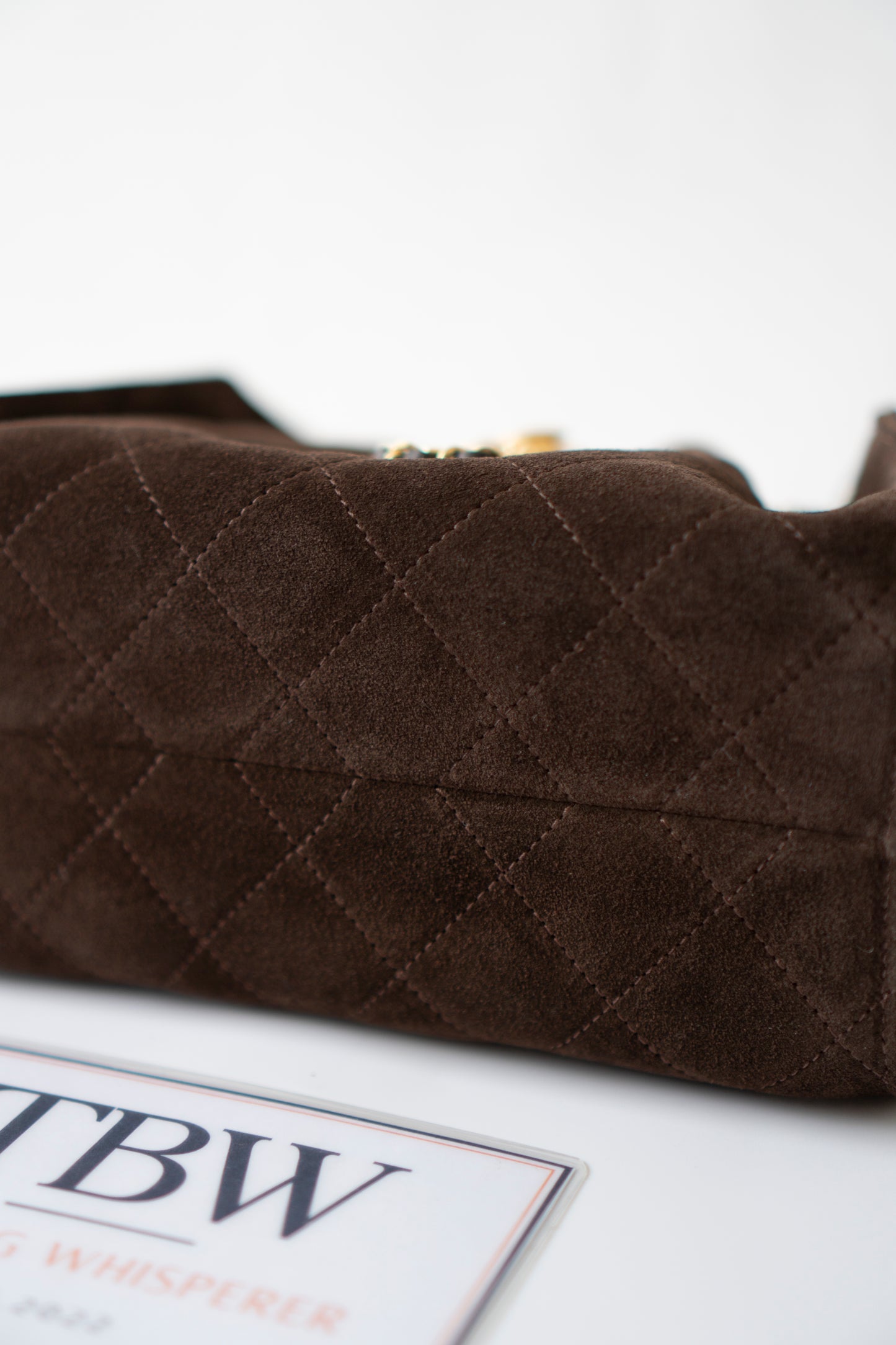 C25 Mini Drawstring Chain Bag – Dark Brown Suede with Gold Hardware