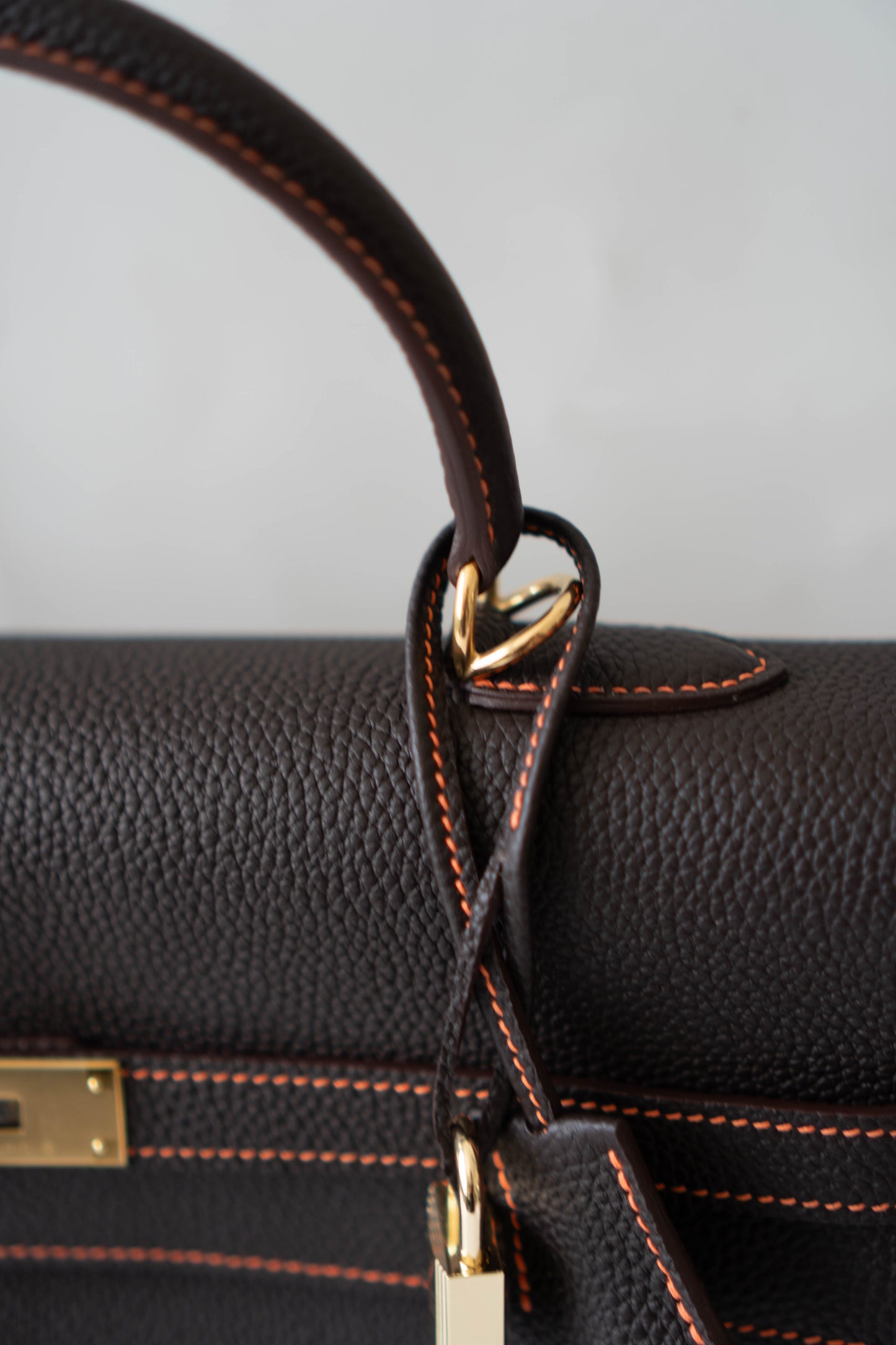 Kelly 40 HSS Special Order – Ebene Togo with Orange Interior