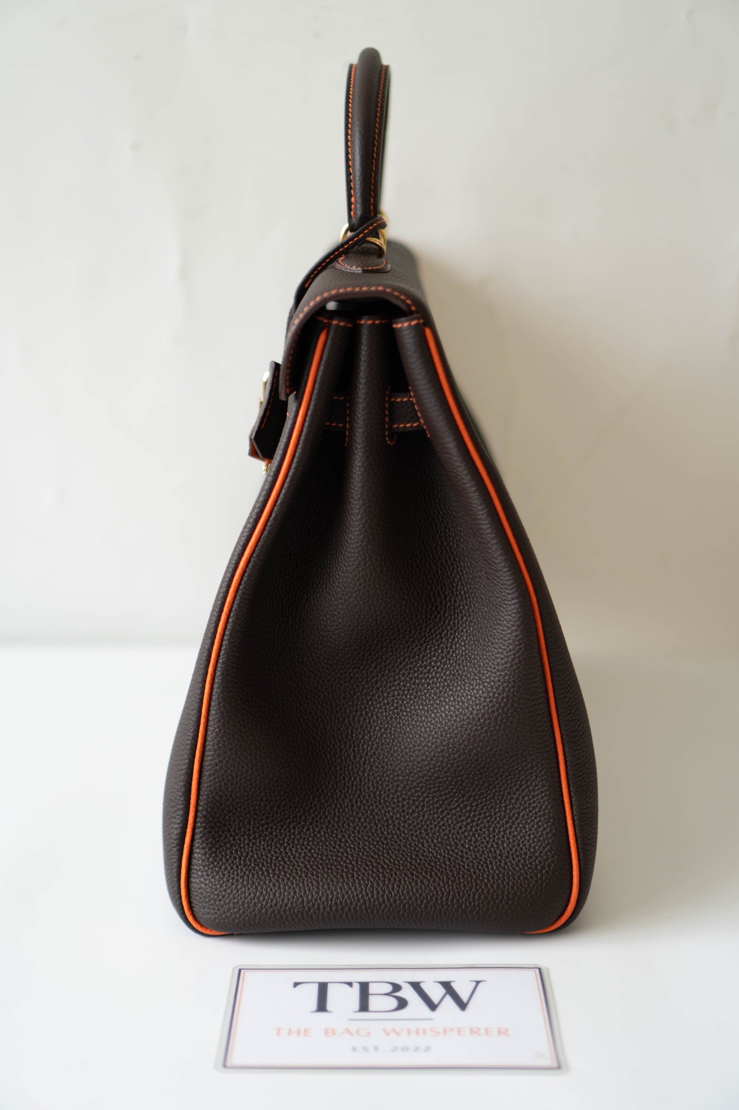 Kelly 40 HSS Special Order – Ebene Togo with Orange Interior