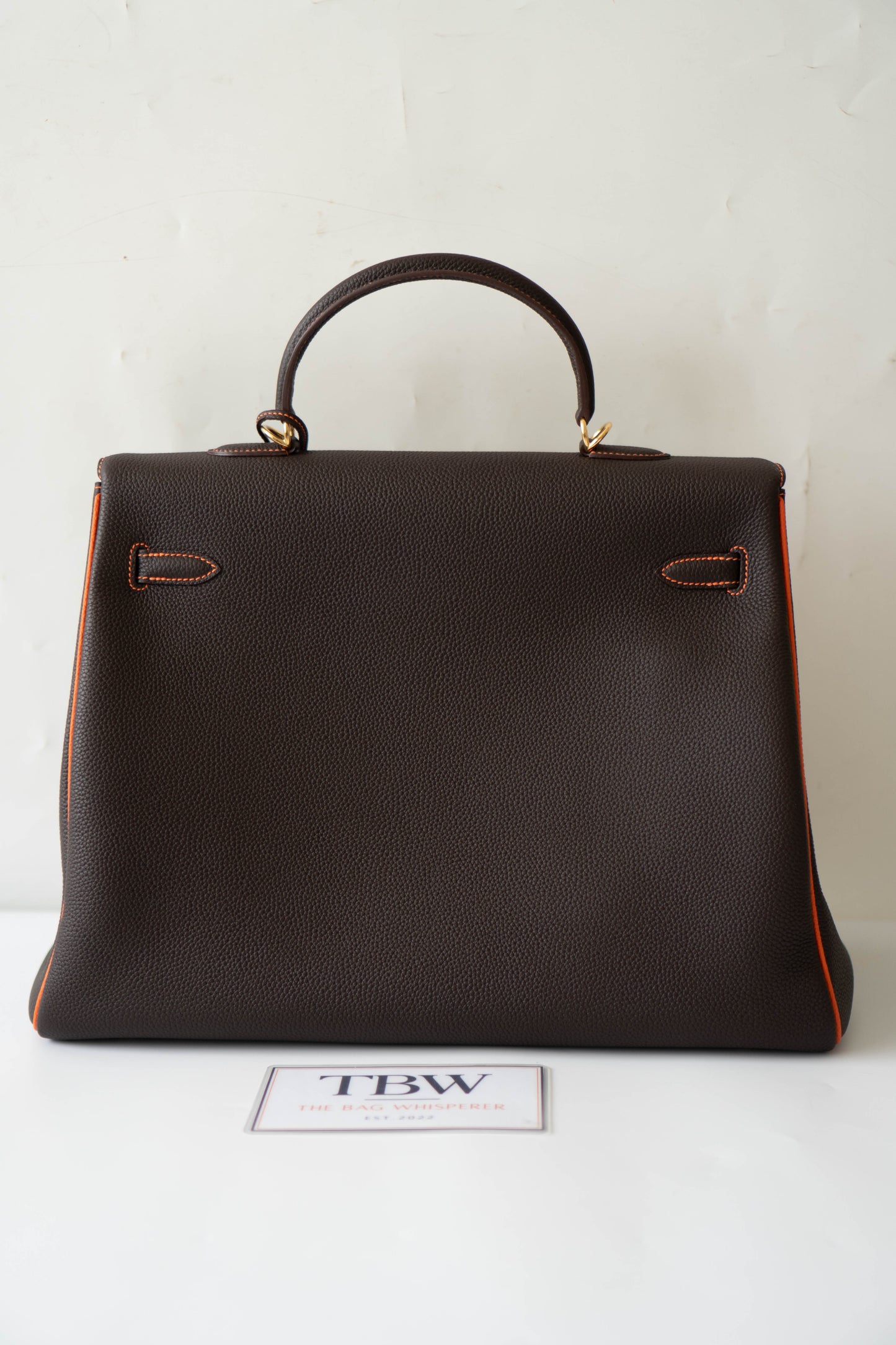 Kelly 40 HSS Special Order – Ebene Togo with Orange Interior