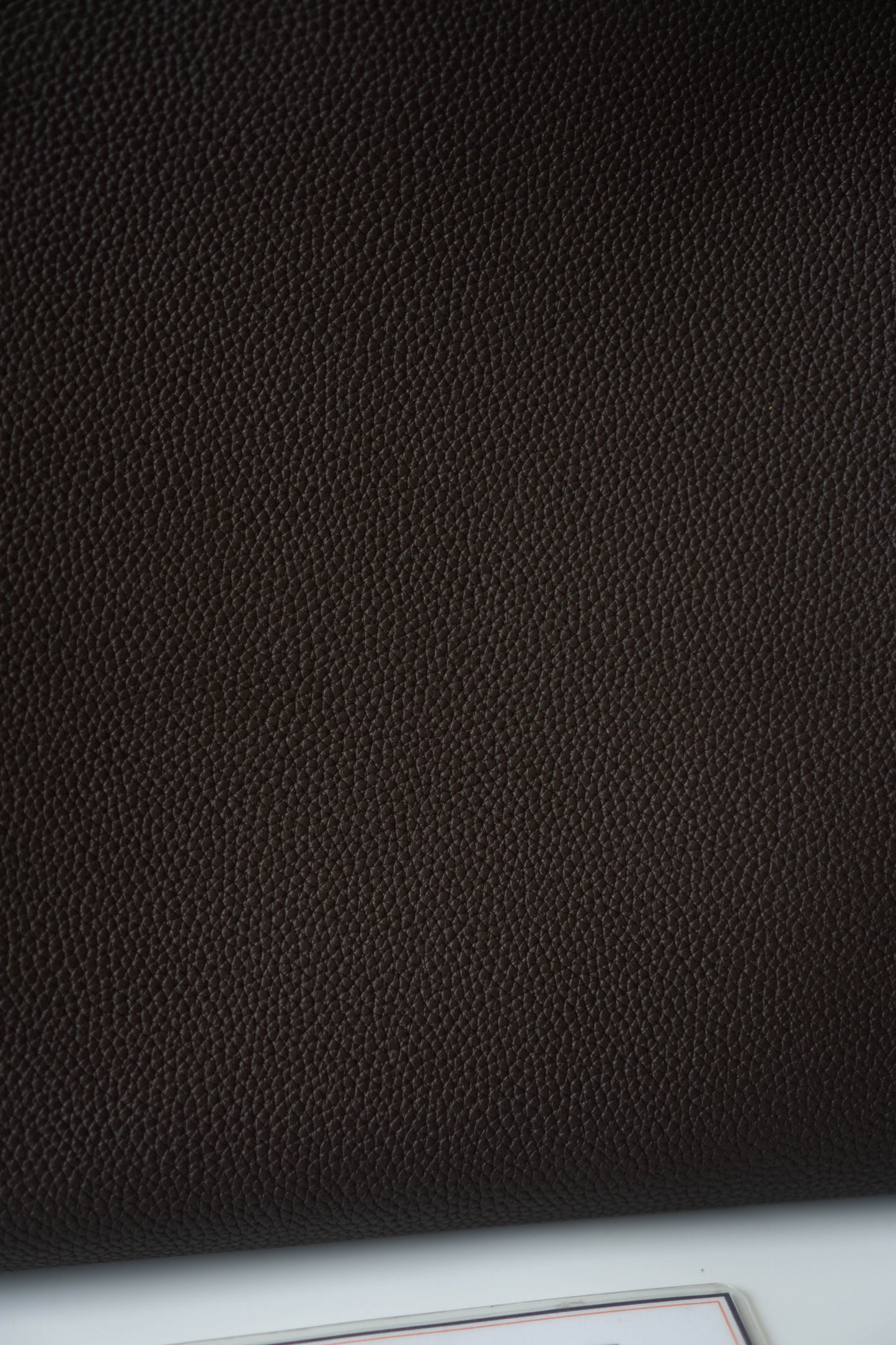 Kelly 40 HSS Special Order – Ebene Togo with Orange Interior