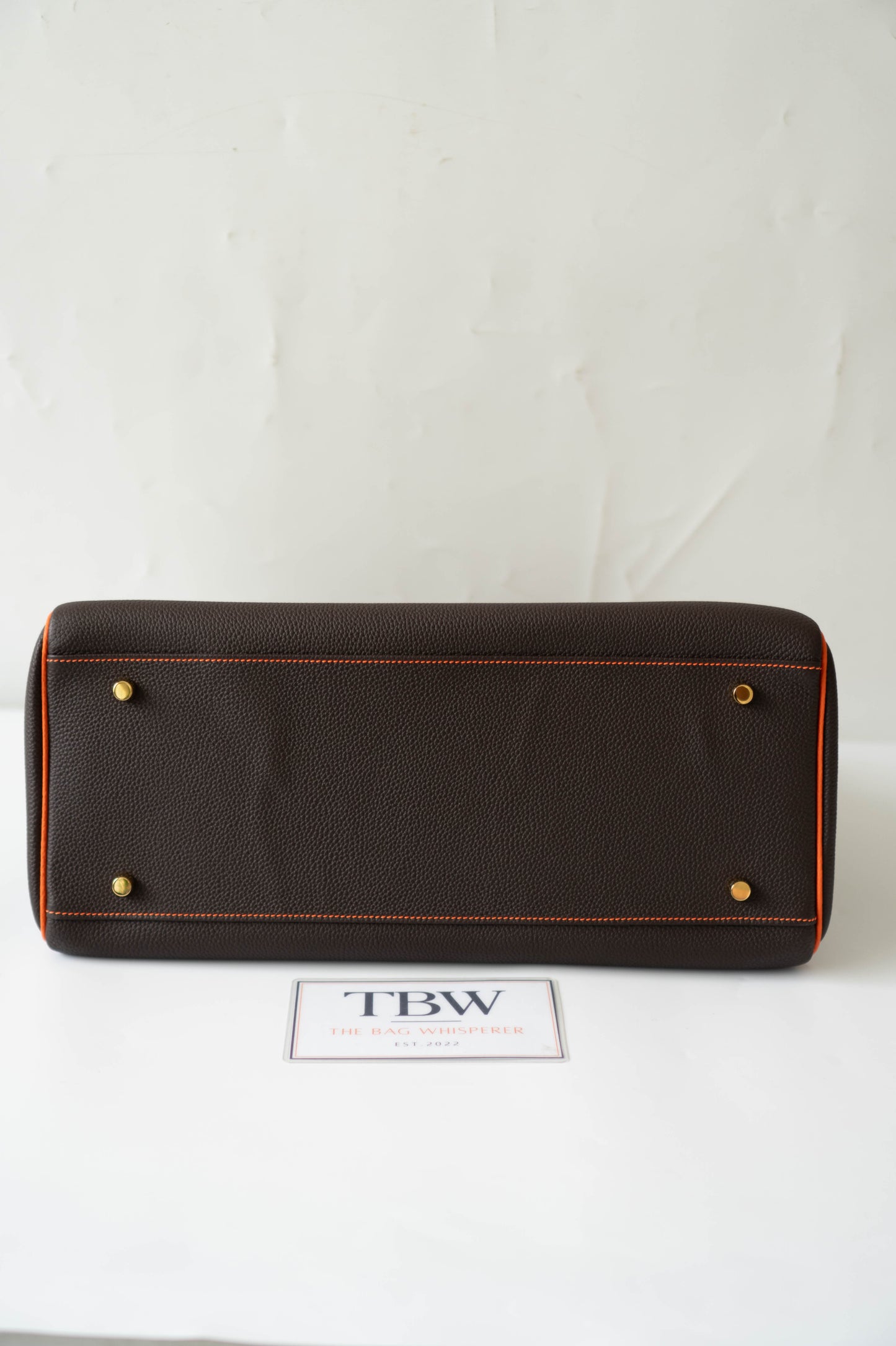 Kelly 40 HSS Special Order – Ebene Togo with Orange Interior