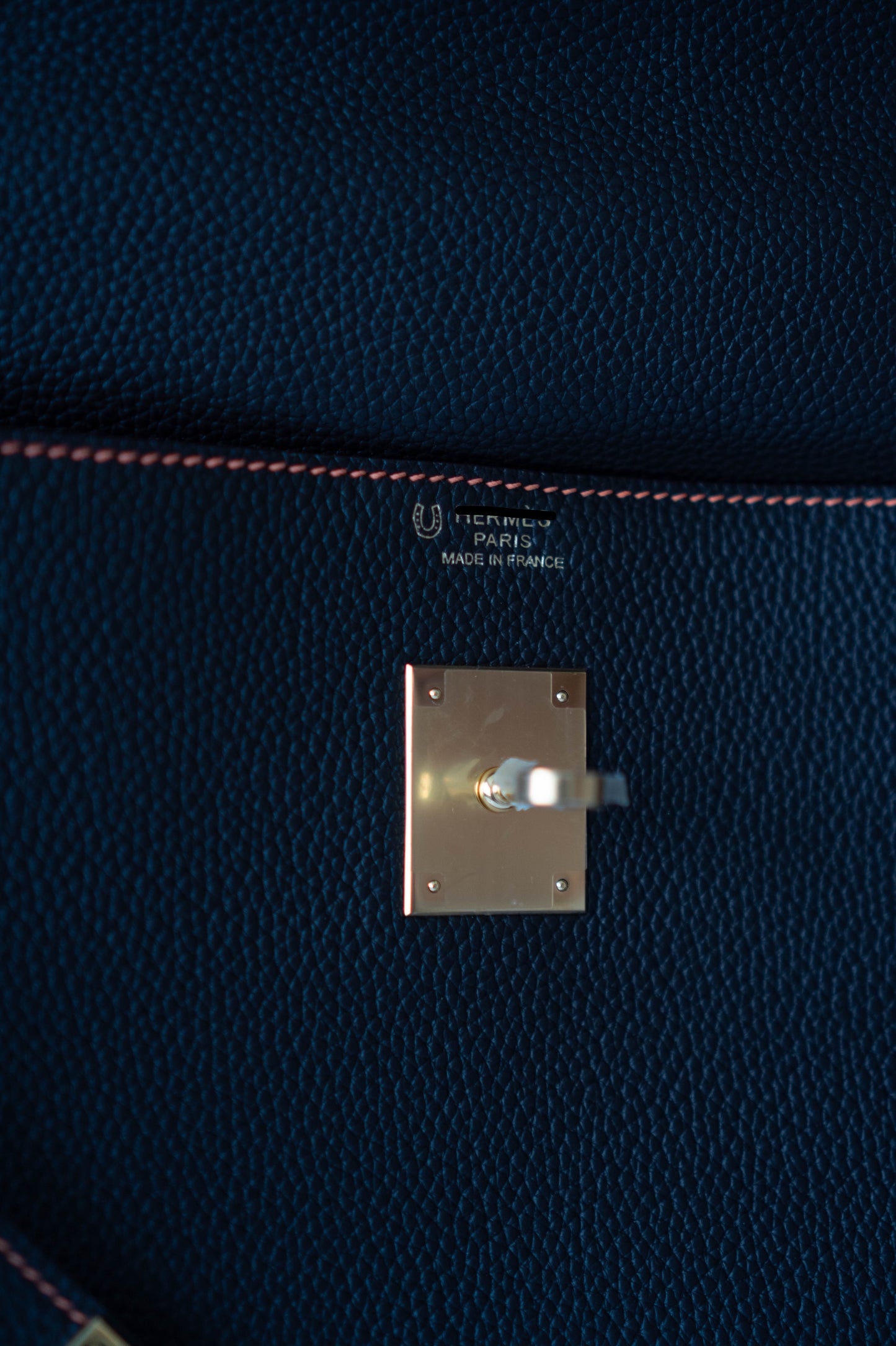 Kelly 40 HSS Special Order – Ebene Togo with Orange Interior