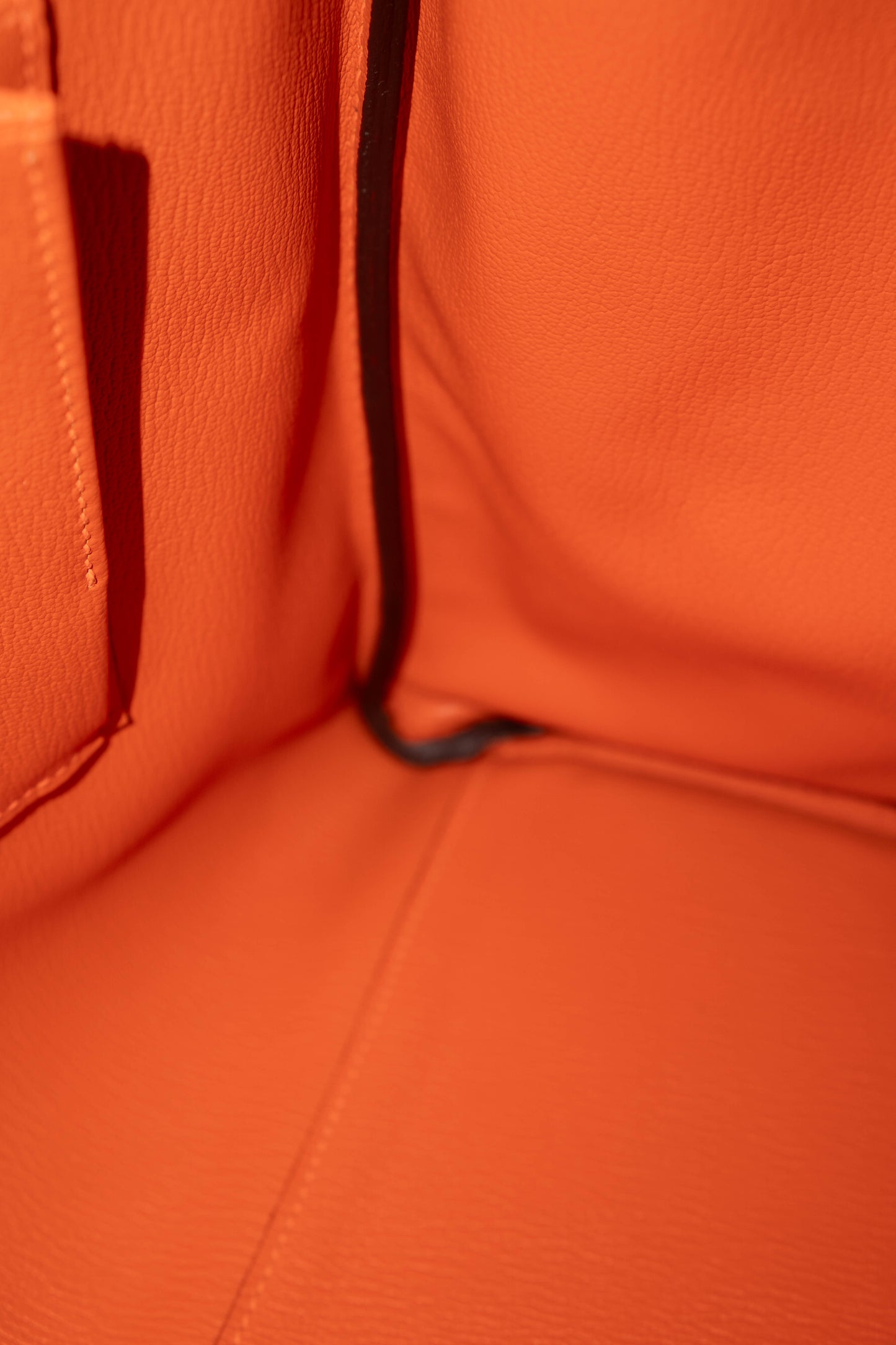 Kelly 40 HSS Special Order – Ebene Togo with Orange Interior