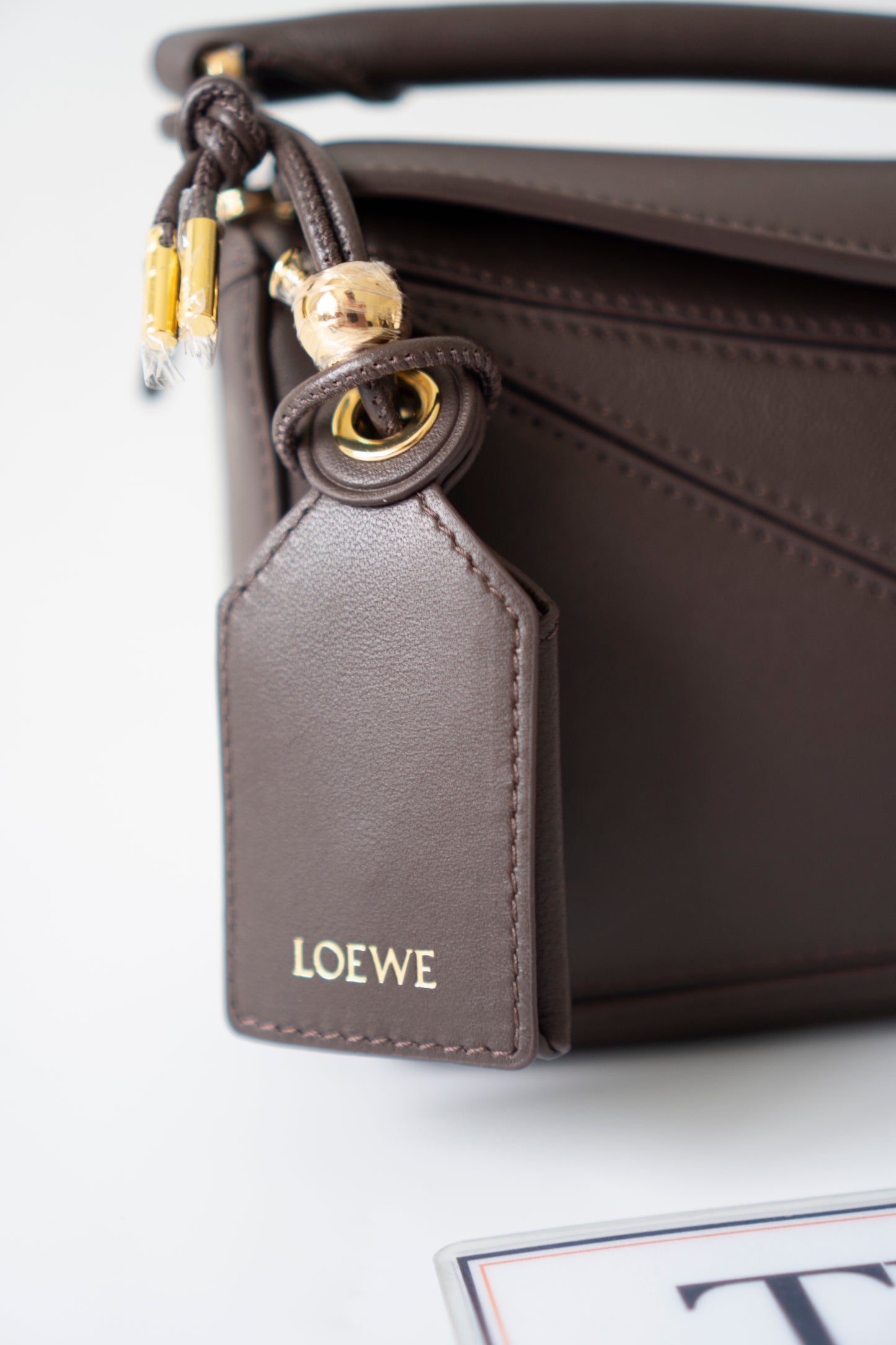 Mini Puzzle Featherlight – Dark Brown Leather with Gold Hardware