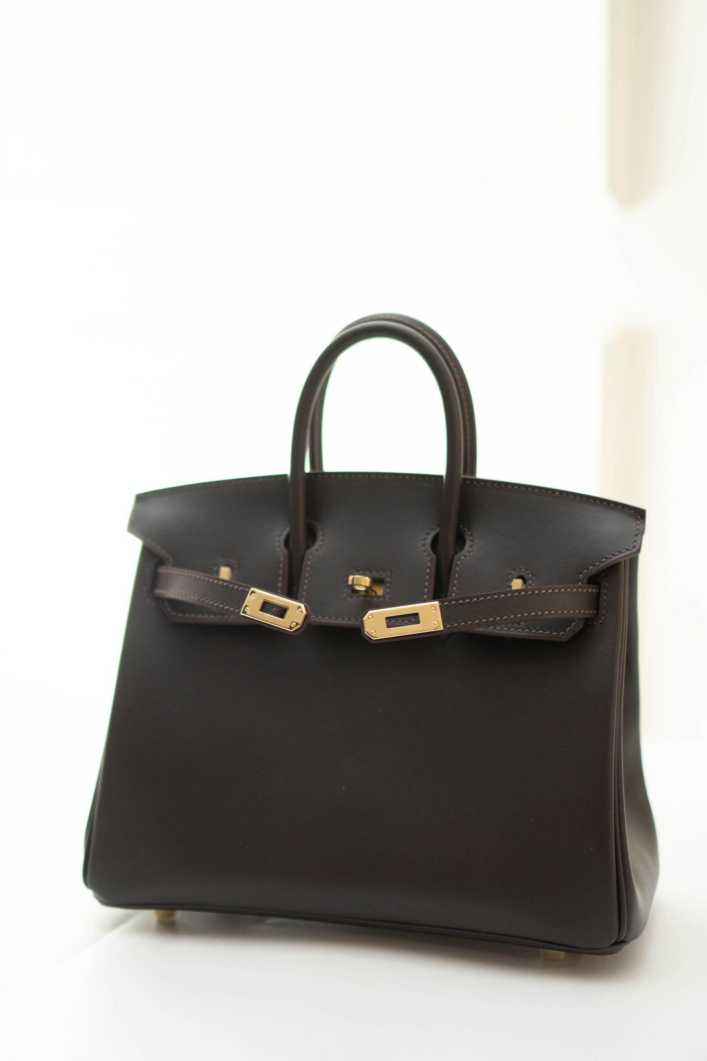 Birkin 25 in Ebene Permabrass Hardware