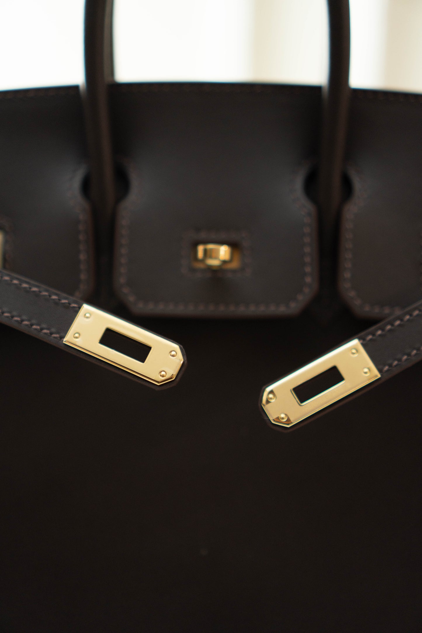 Birkin 25 in Ebene Permabrass Hardware