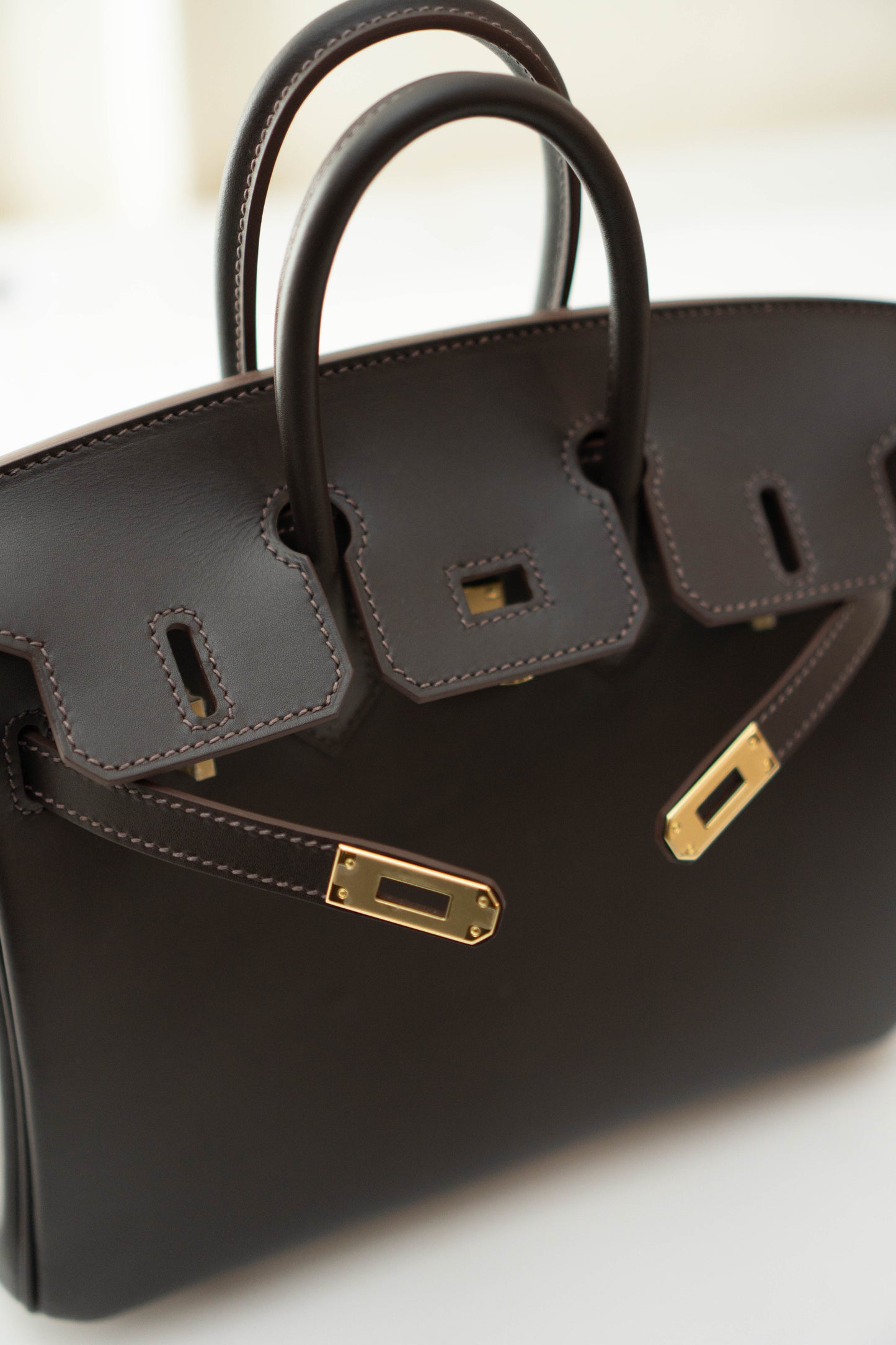 Birkin 25 in Ebene Permabrass Hardware