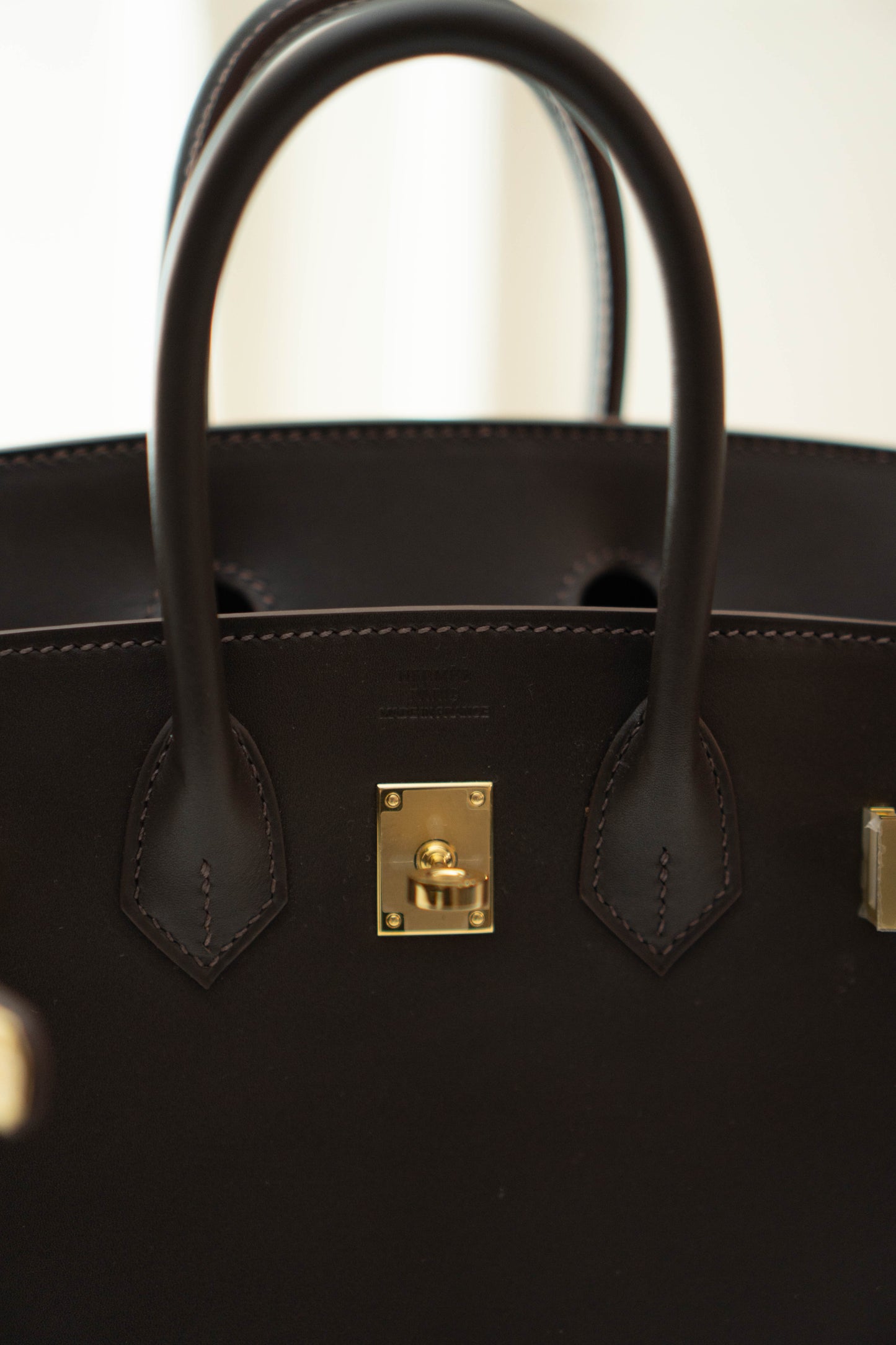 Birkin 25 in Ebene Permabrass Hardware