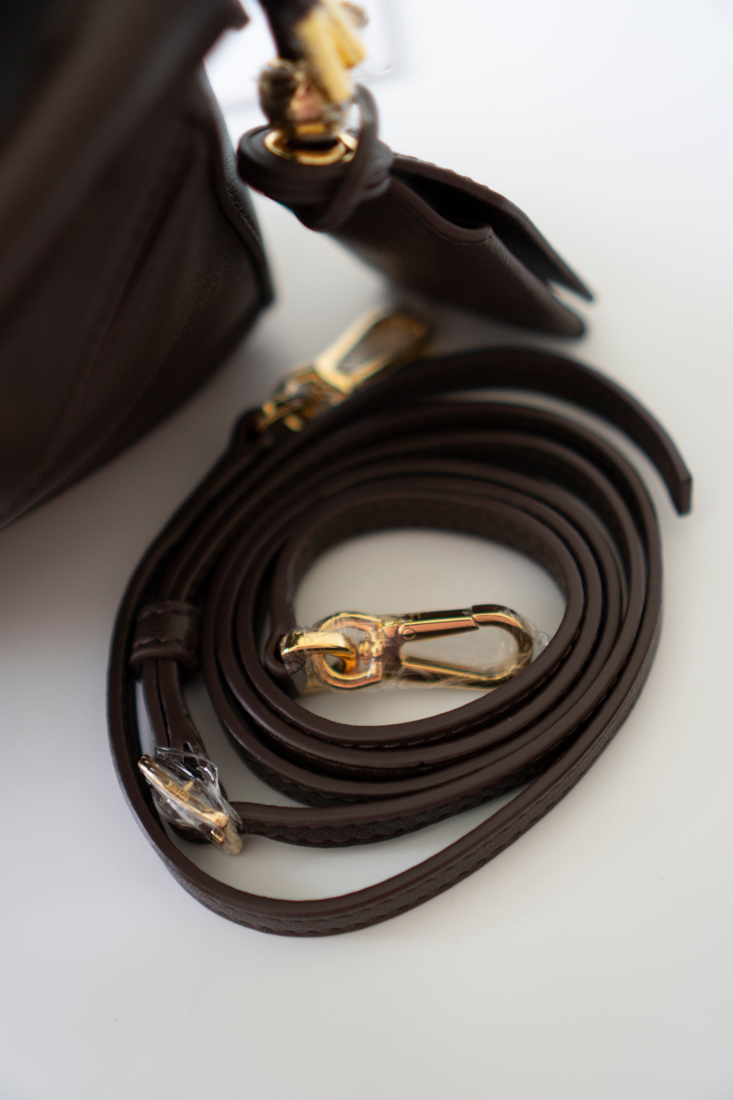 Mini Puzzle Featherlight – Dark Brown Leather with Gold Hardware