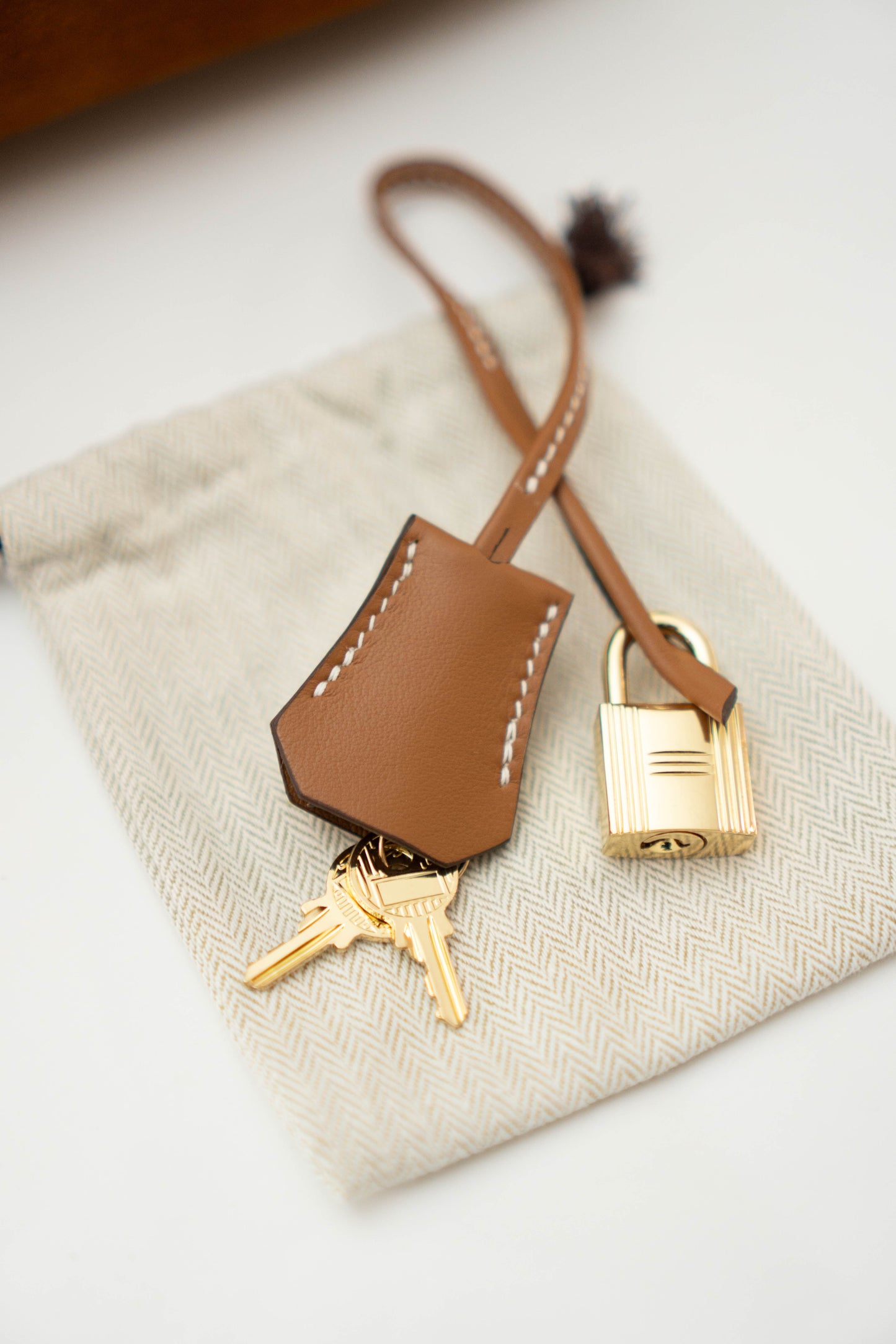 BK 35 Grizzly in Gold Swift Suede leather with Gold Hardware