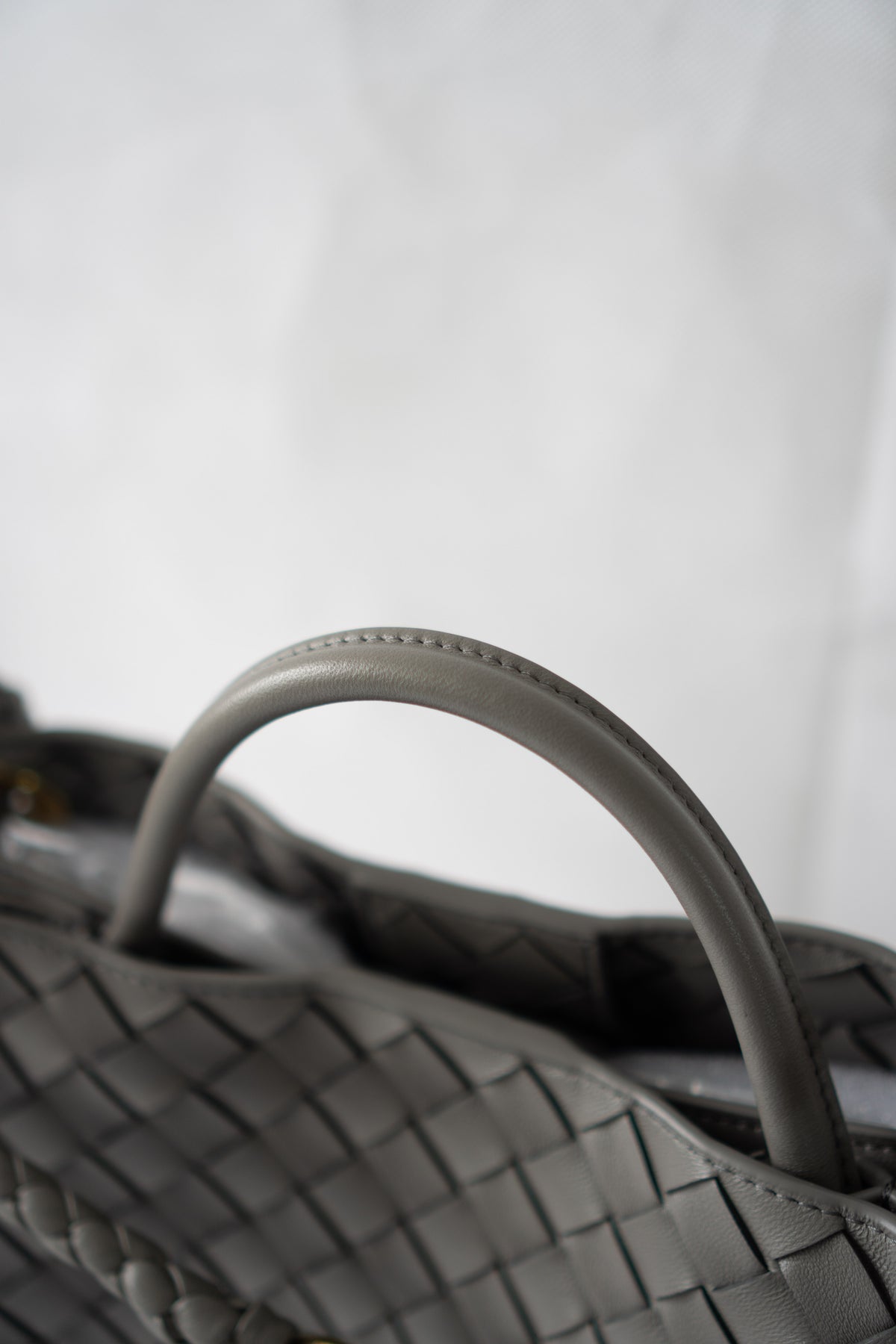 Andiamo – Medium Grey Intrecciato Leather with Gold Hardware