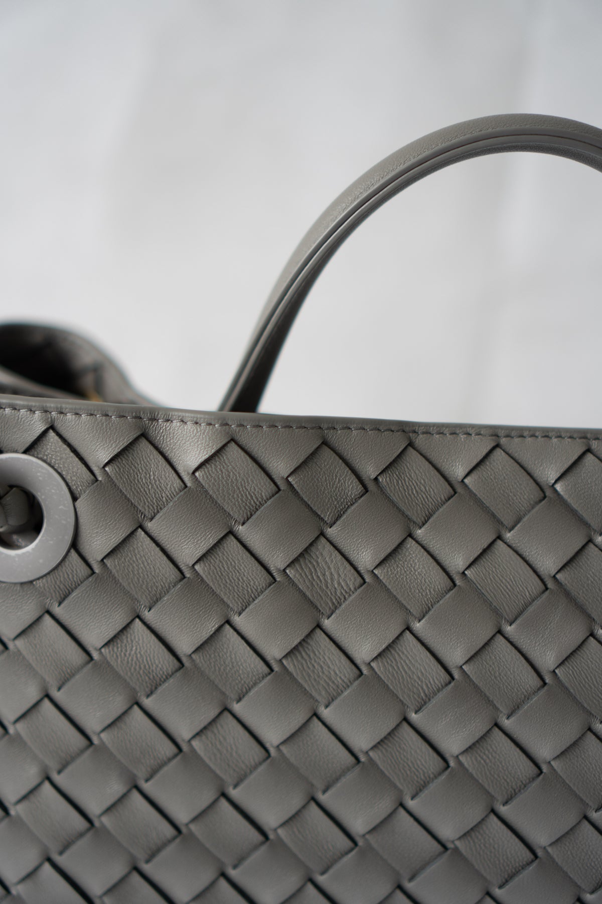 Andiamo – Medium Grey Intrecciato Leather with Gold Hardware