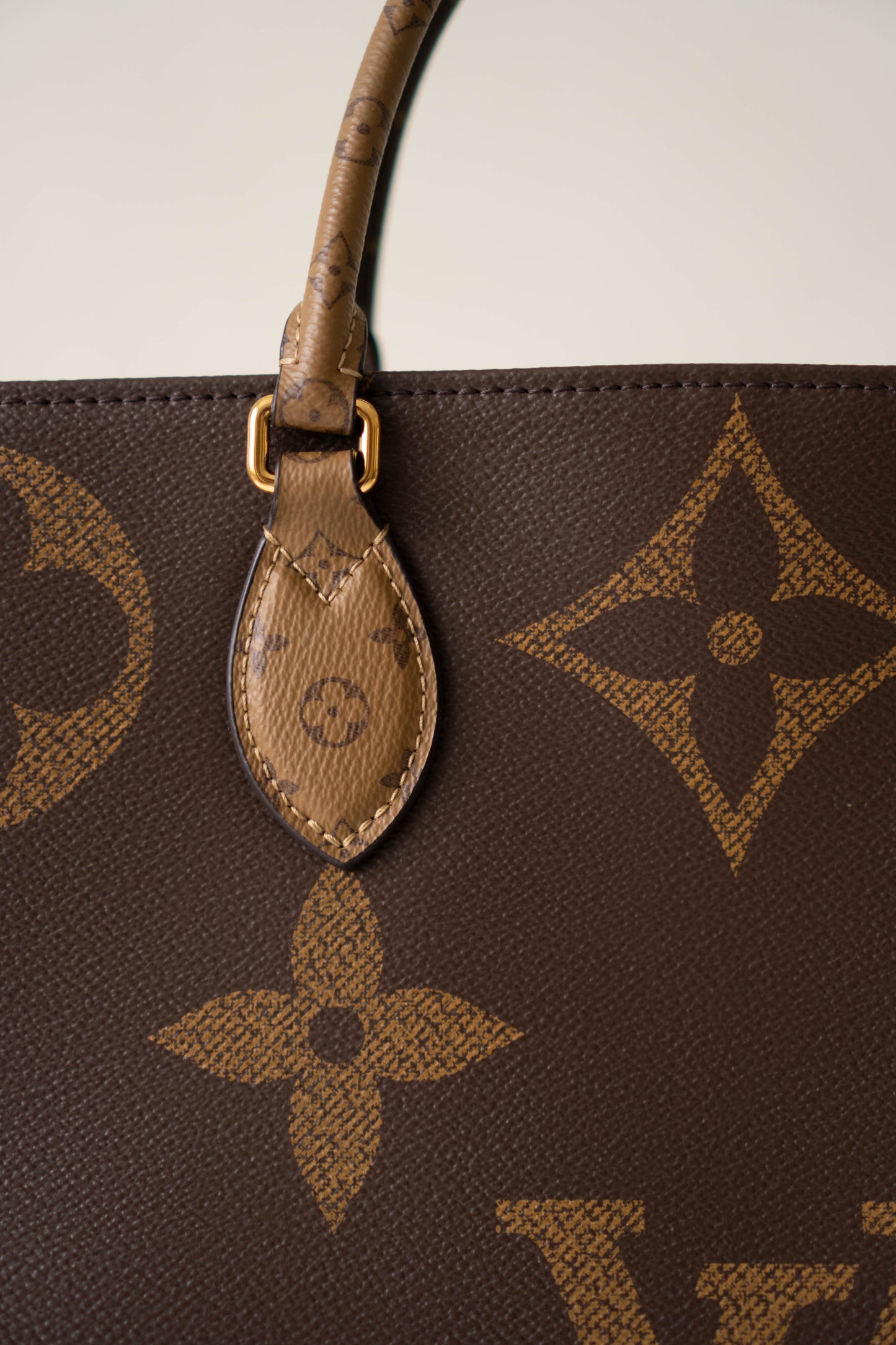 OnTheGo GM Tote Bag in Monogram  & Reverse Monogram with Gold Hardware