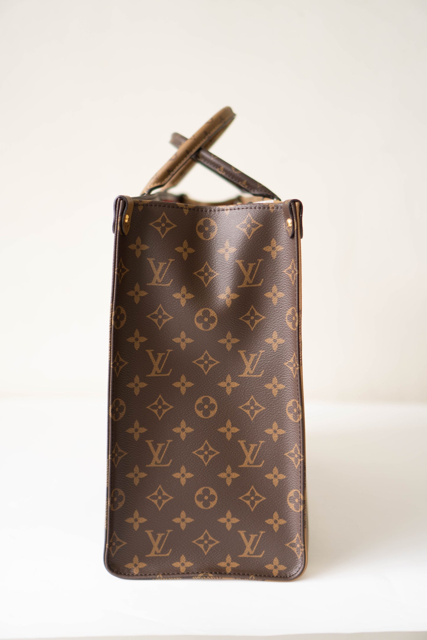 OnTheGo GM Tote Bag in Monogram  & Reverse Monogram with Gold Hardware
