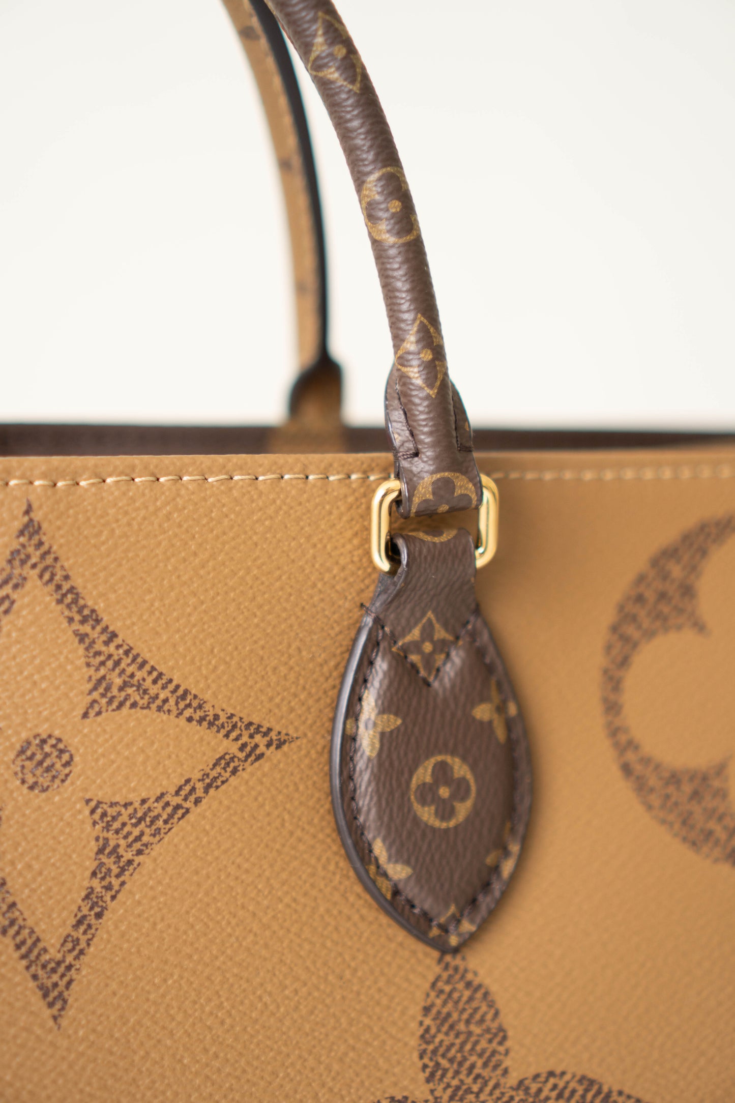 OnTheGo GM Tote Bag in Monogram  & Reverse Monogram with Gold Hardware