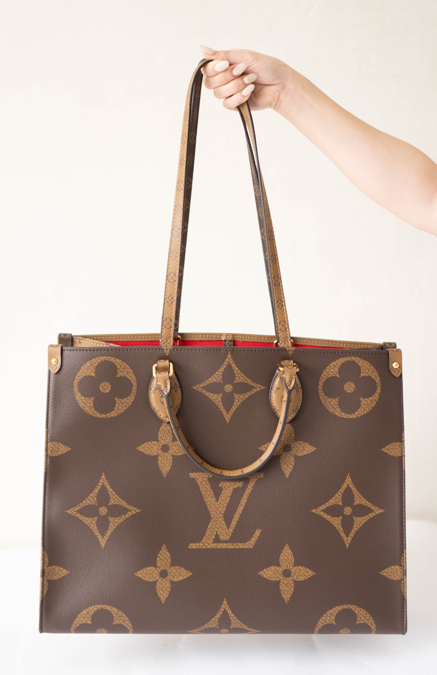 OnTheGo GM Tote Bag in Monogram  & Reverse Monogram with Gold Hardware