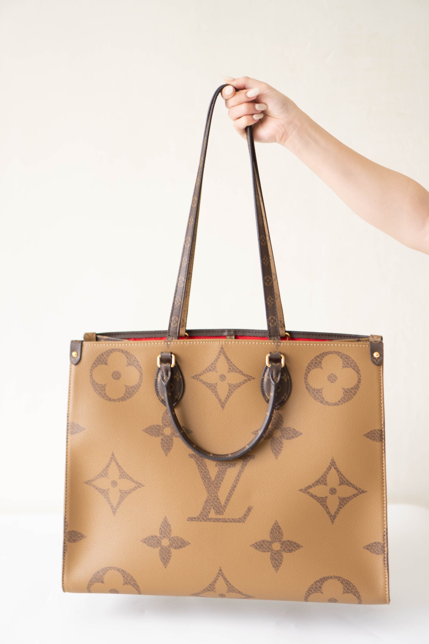 OnTheGo GM Tote Bag in Monogram  & Reverse Monogram with Gold Hardware