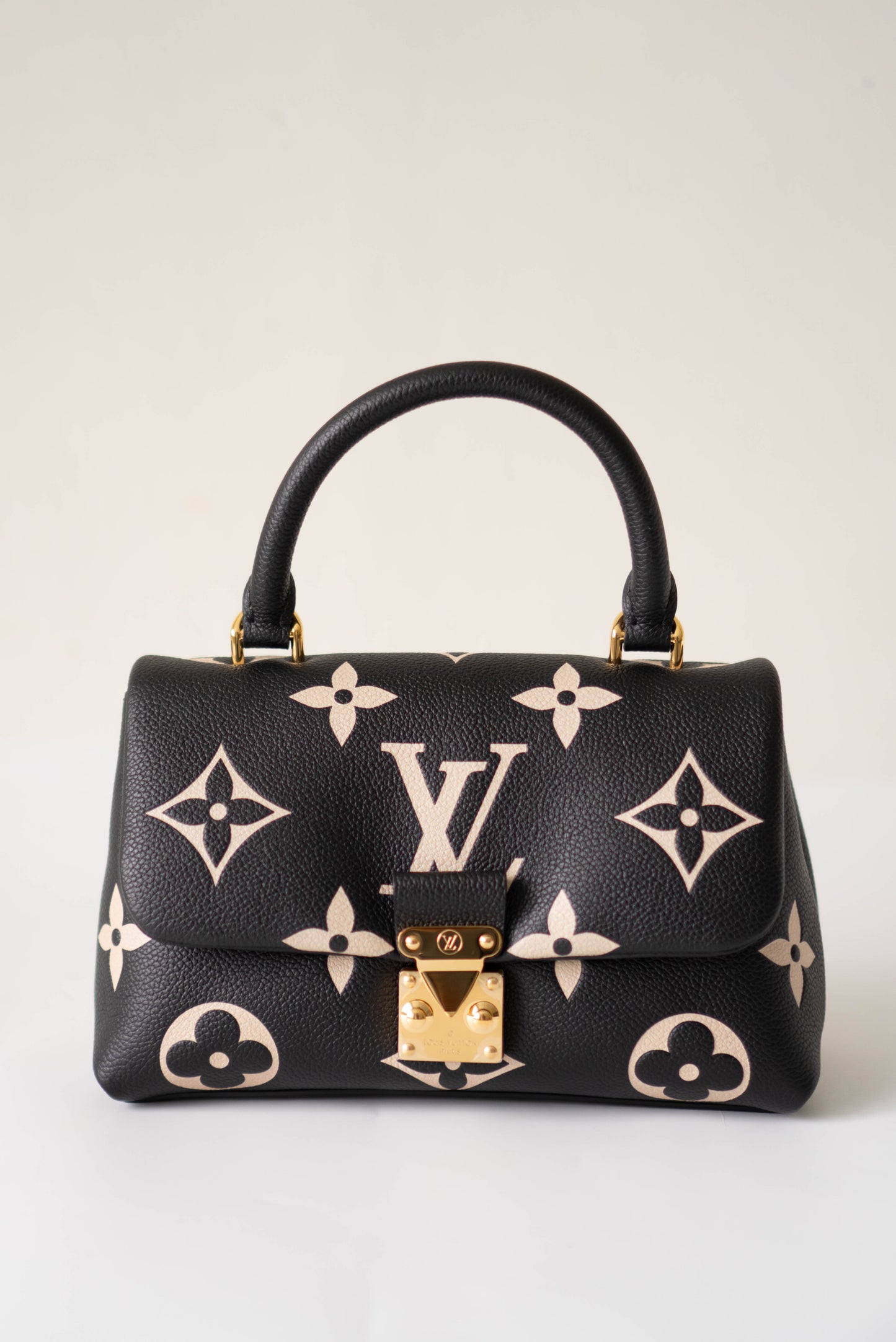 Madeleine BB in Black Bicolor Monogram Empreinte Leather in Gold Hardware