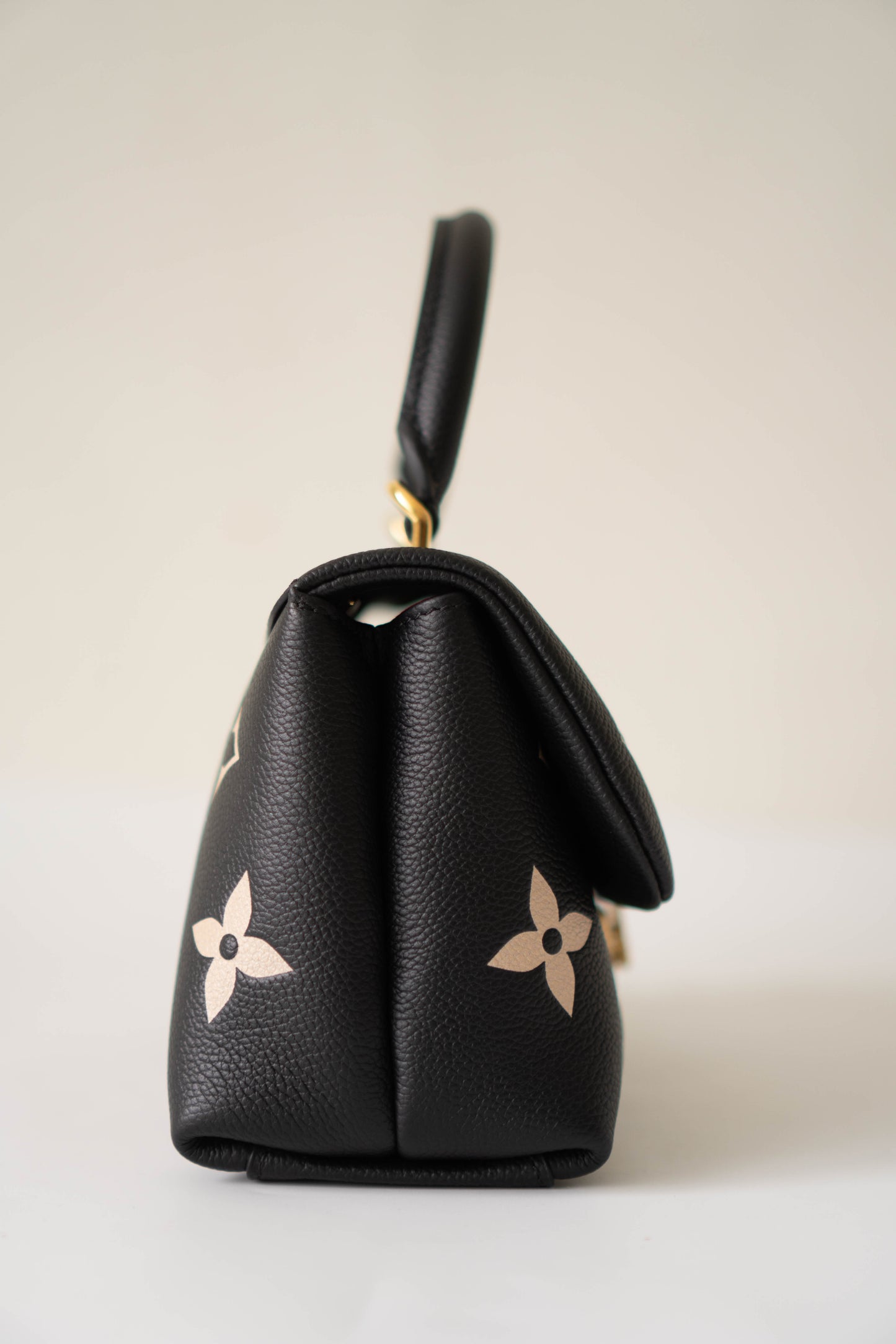 Madeleine BB in Black Bicolor Monogram Empreinte Leather in Gold Hardware