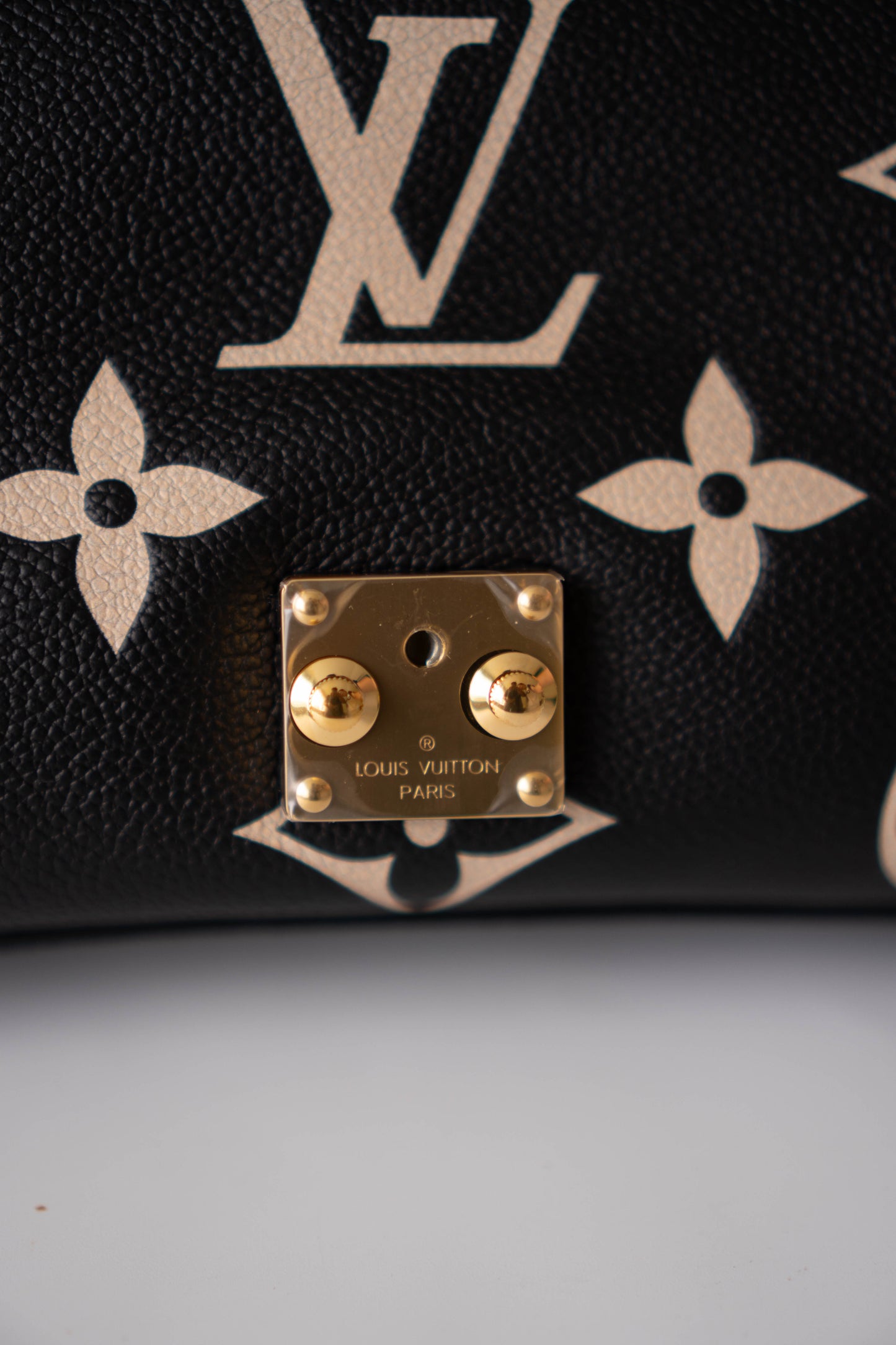 Madeleine BB in Black Bicolor Monogram Empreinte Leather in Gold Hardware
