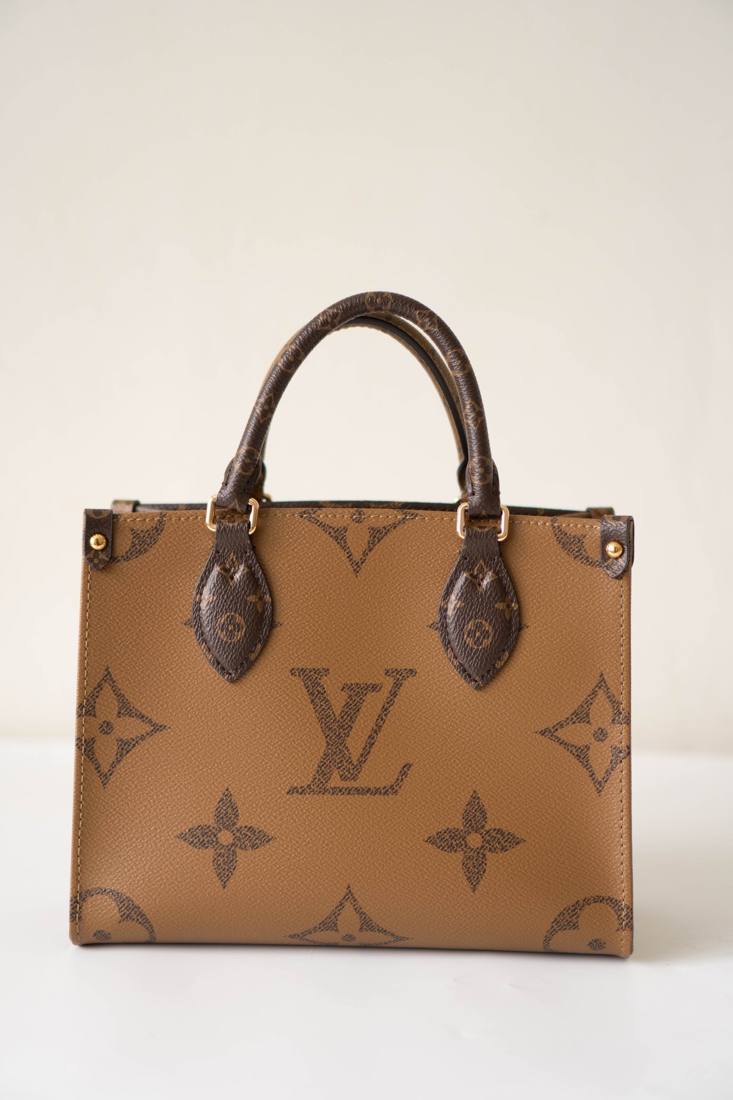 OnTheGo PM in Monogram & Reverse Monogram With Gold Hardware