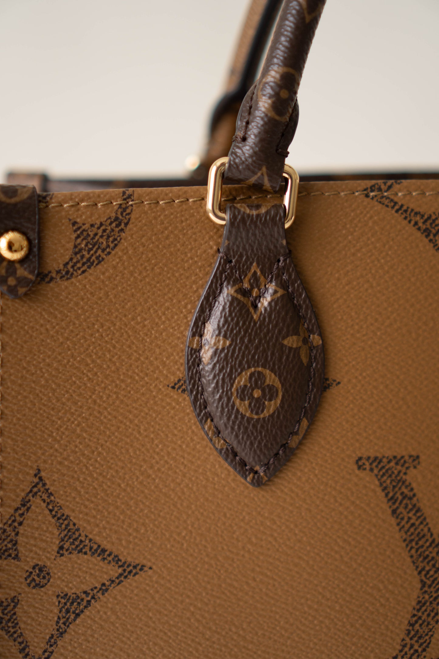 OnTheGo PM in Monogram & Reverse Monogram With Gold Hardware