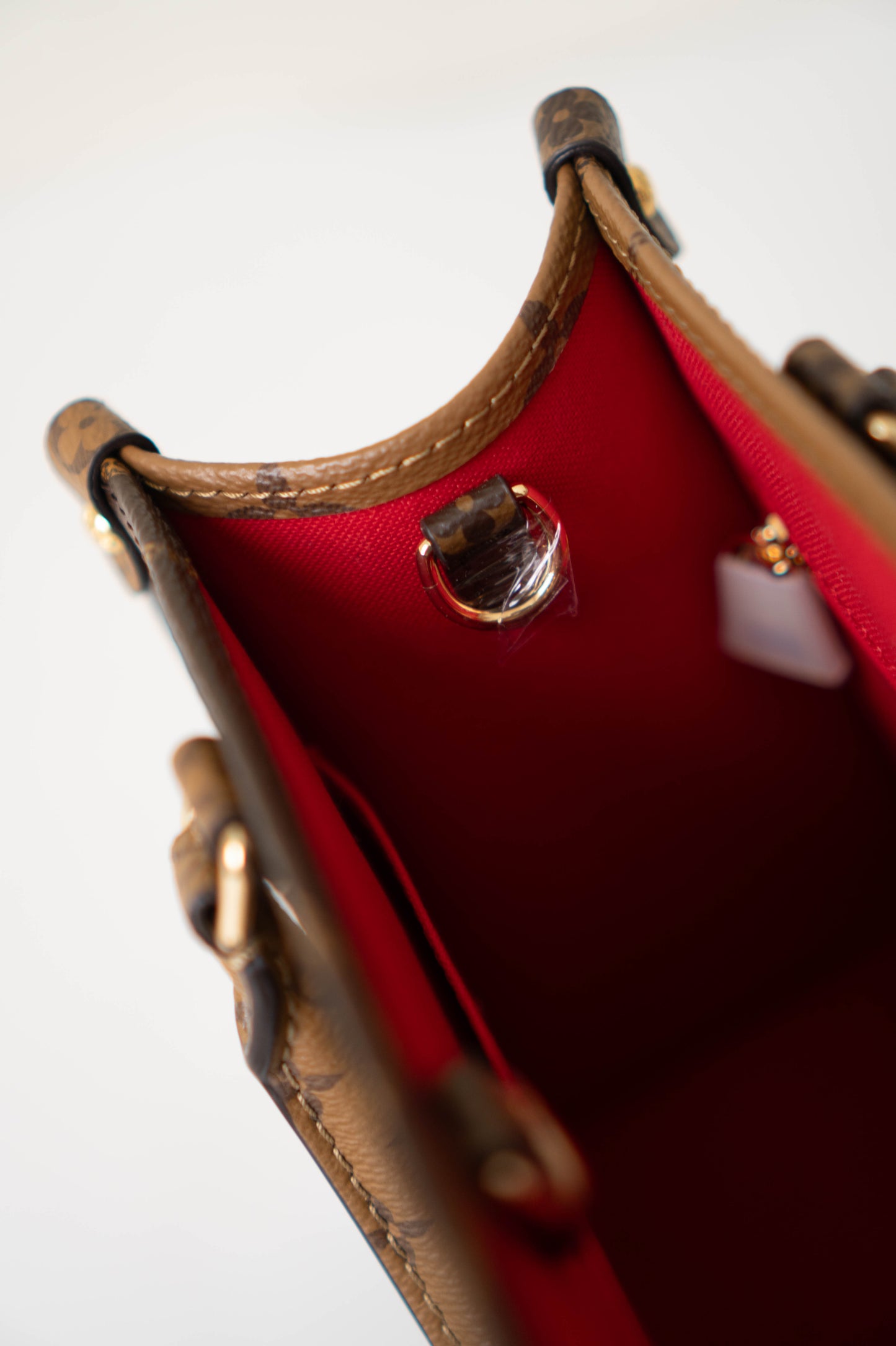 OnTheGo PM in Monogram & Reverse Monogram With Gold Hardware