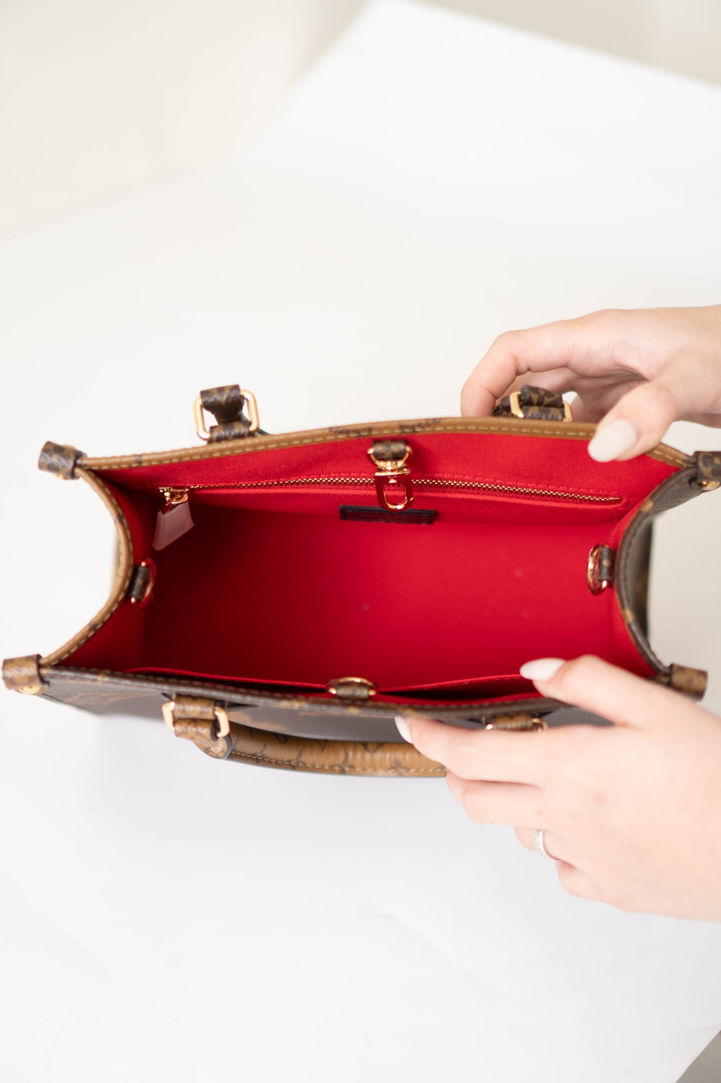 OnTheGo PM in Monogram & Reverse Monogram With Gold Hardware