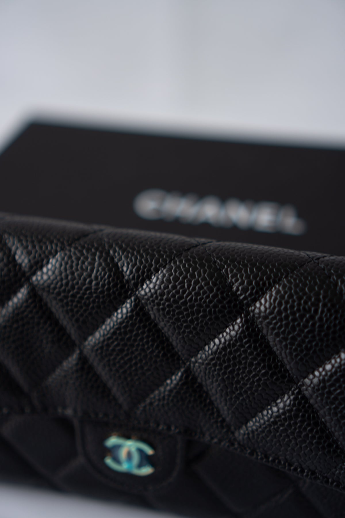 Classic Flap Long Wallet – Black Caviar Leather with Iridescent Hardware