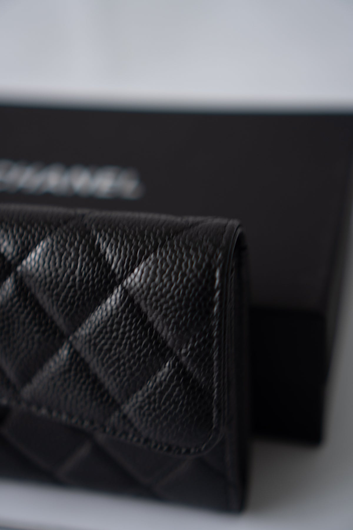 Classic Flap Long Wallet – Black Caviar Leather with Iridescent Hardware