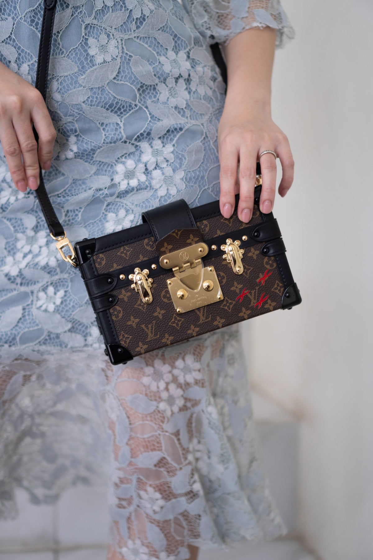 Petite Malle – Monogram Canvas with Black Calfskin & Gold-Tone Hardware