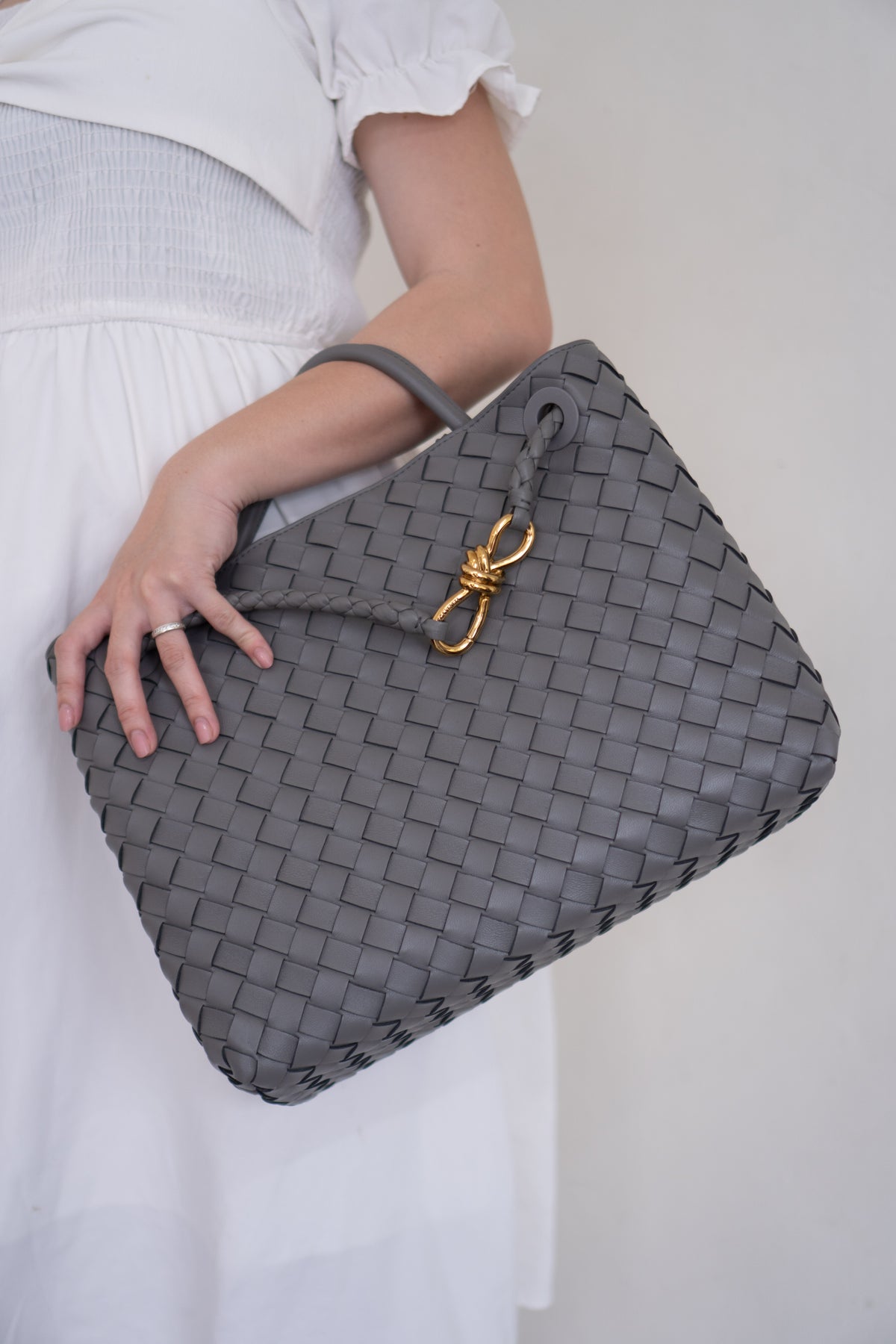 Andiamo – Medium Grey Intrecciato Leather with Gold Hardware