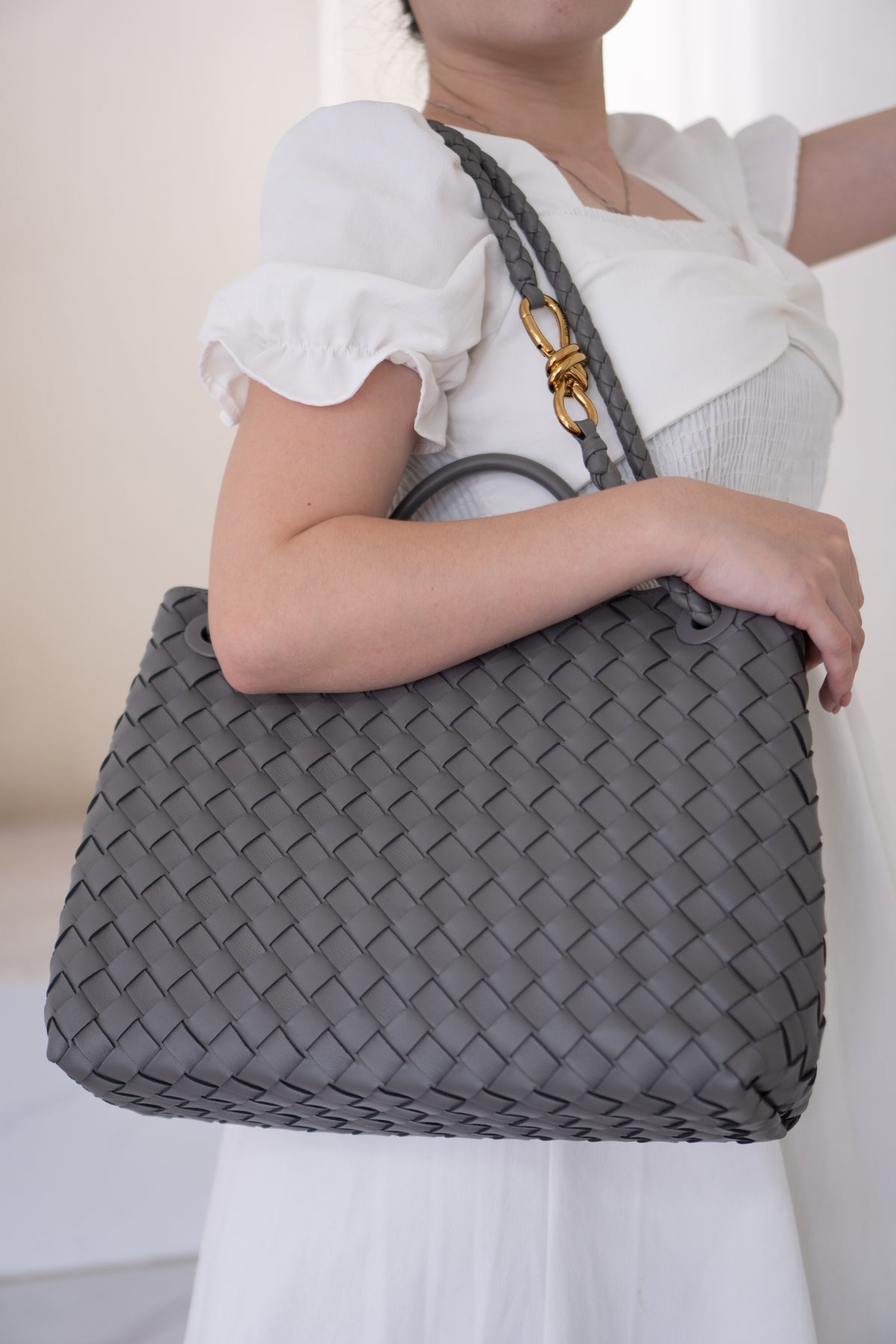 Andiamo – Medium Grey Intrecciato Leather with Gold Hardware
