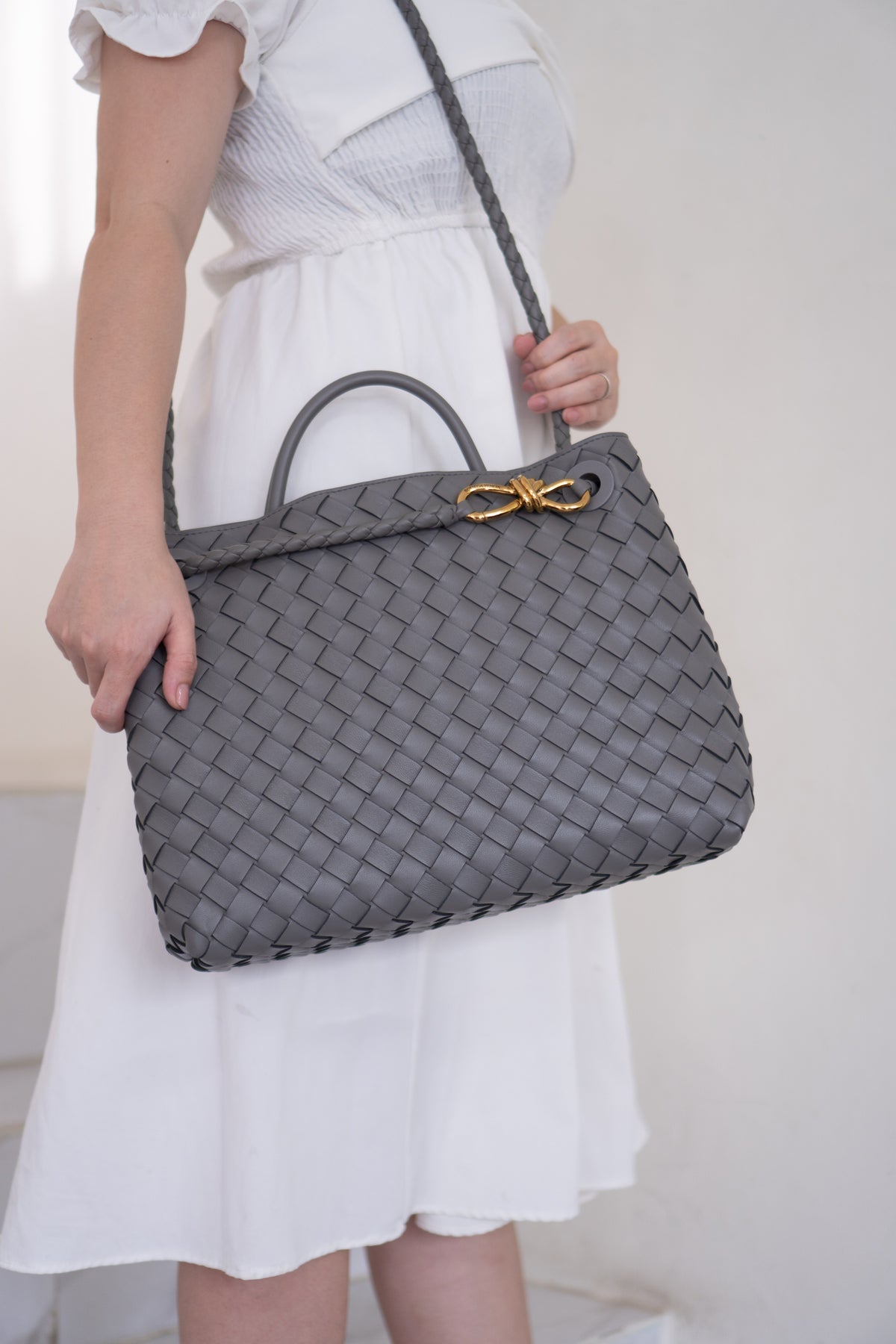 Andiamo – Medium Grey Intrecciato Leather with Gold Hardware