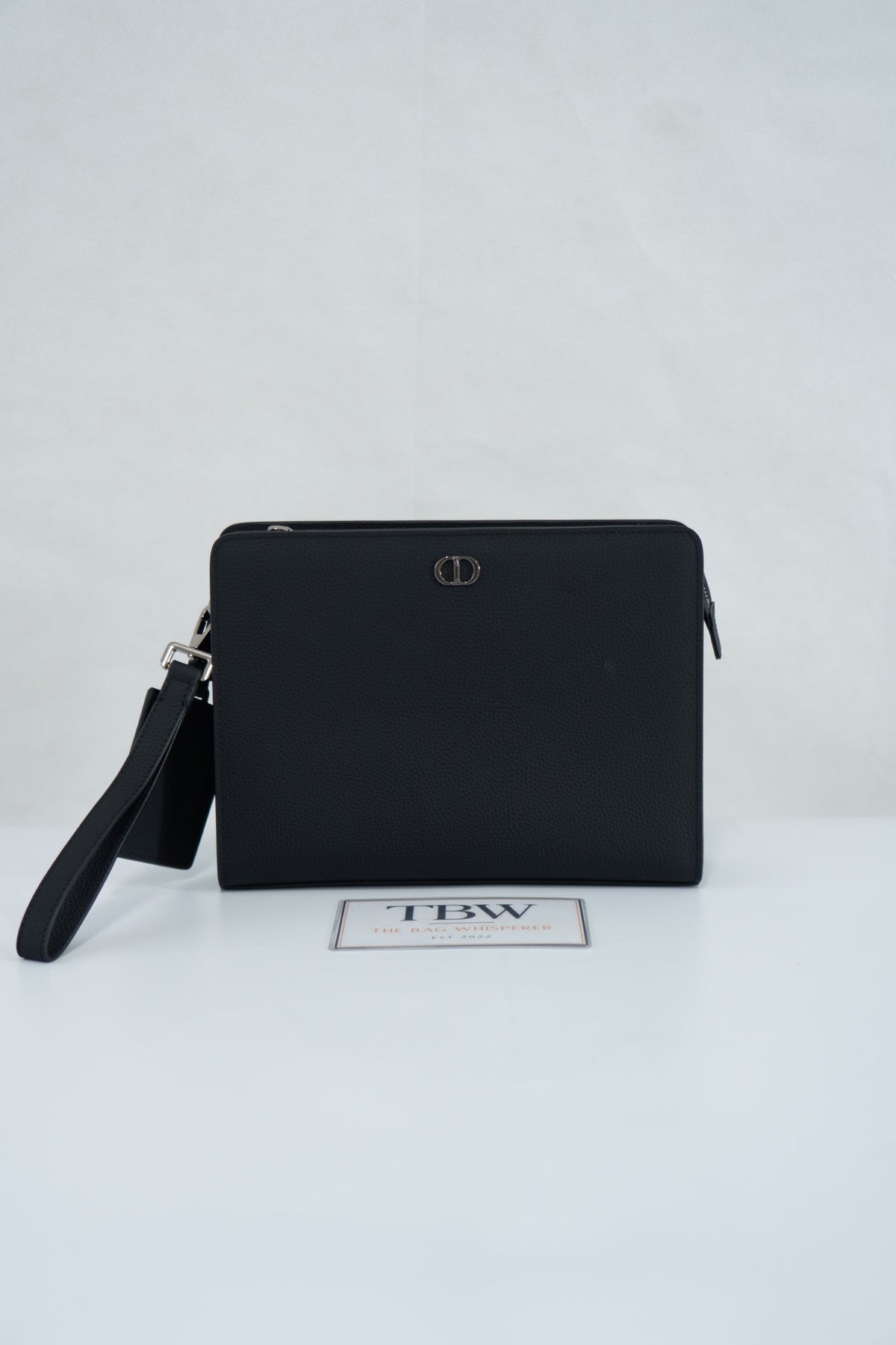 CD Icon A5 Zipped Triangle Pouch – Black Grained Leather with Silver Hardware