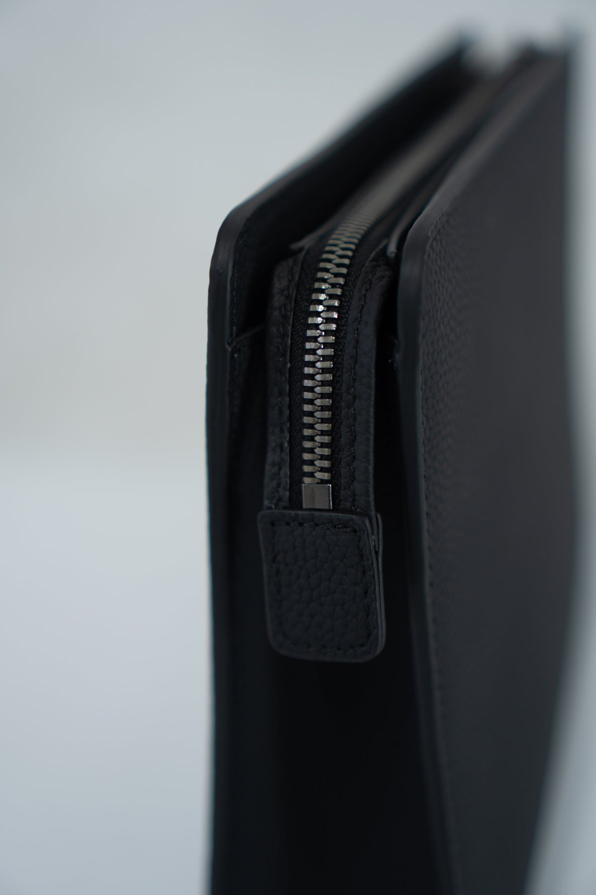 CD Icon A5 Zipped Triangle Pouch – Black Grained Leather with Silver Hardware