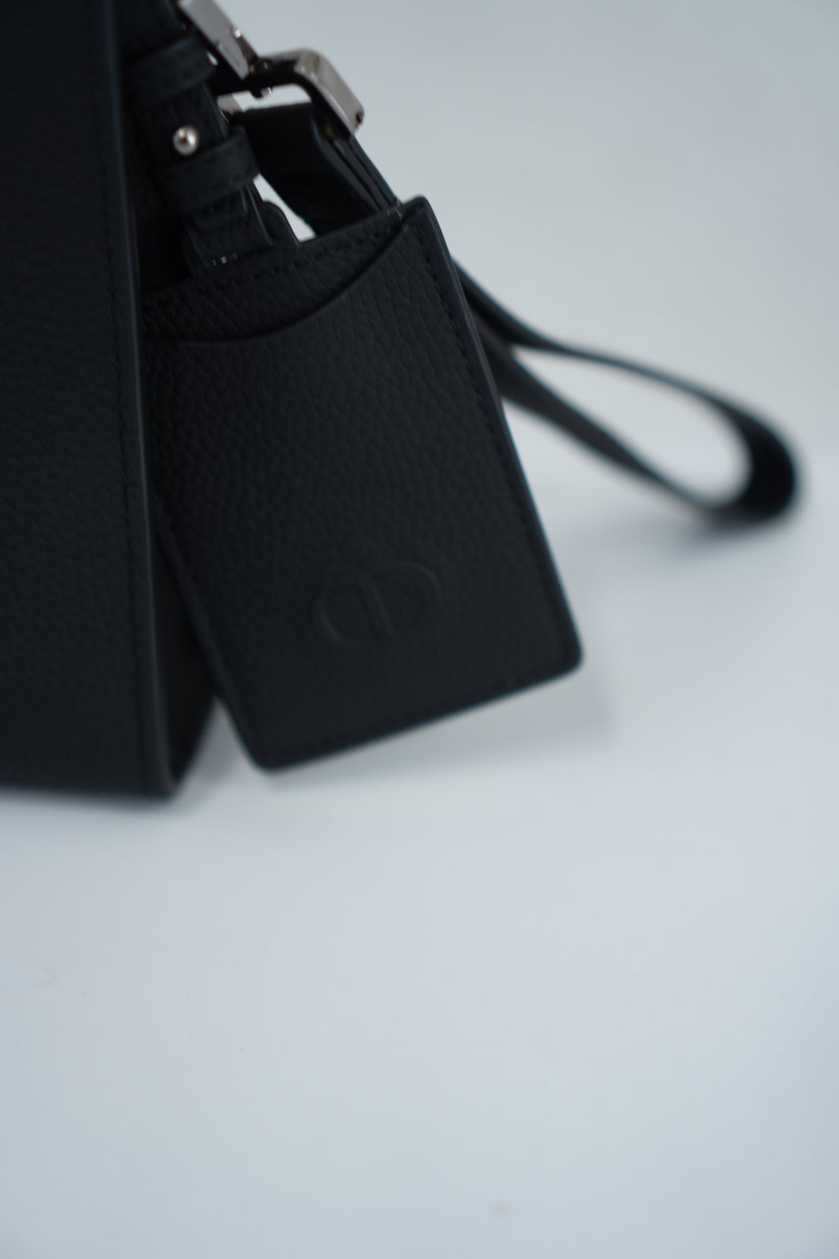 CD Icon A5 Zipped Triangle Pouch – Black Grained Leather with Silver Hardware