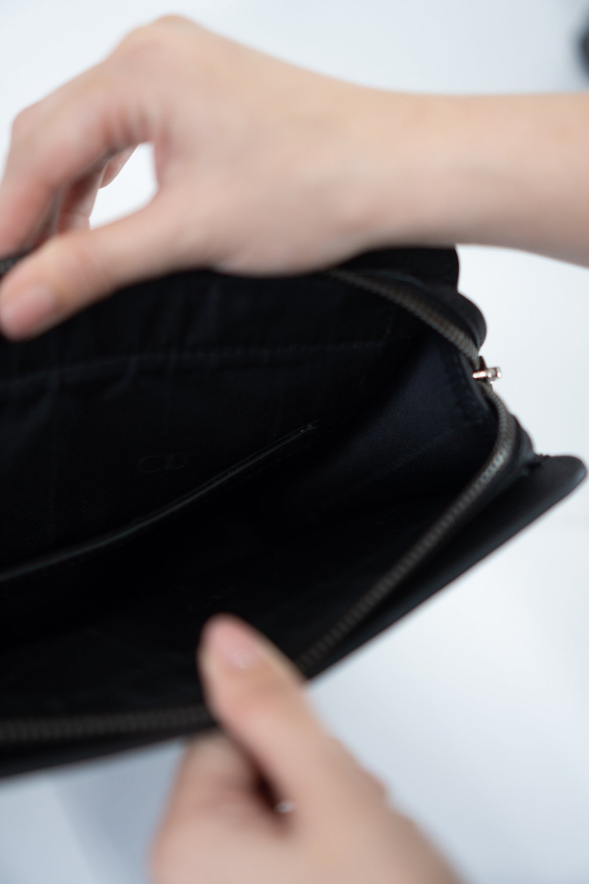 CD Icon A5 Zipped Triangle Pouch – Black Grained Leather with Silver Hardware