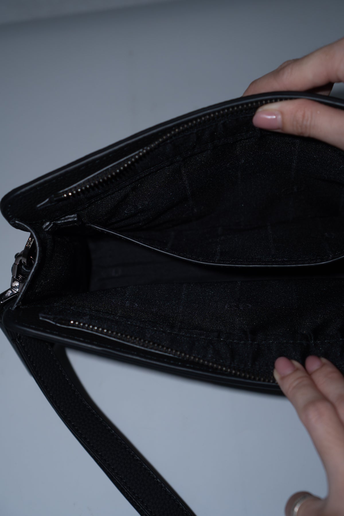 CD Icon A5 Zipped Triangle Pouch – Black Grained Leather with Silver Hardware