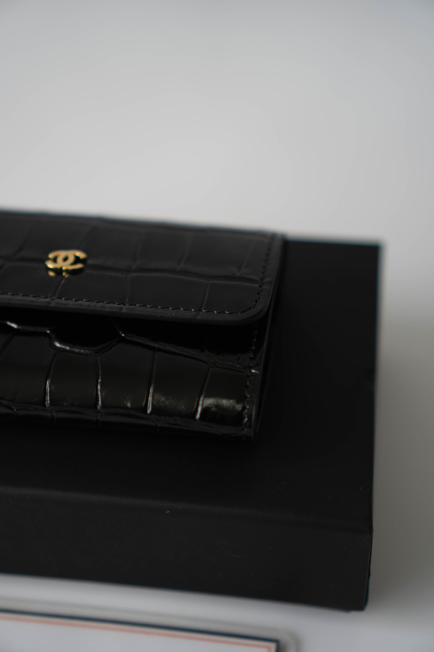 Compact Card Holder – Black Croc-Embossed Calfskin with Gold Hardware