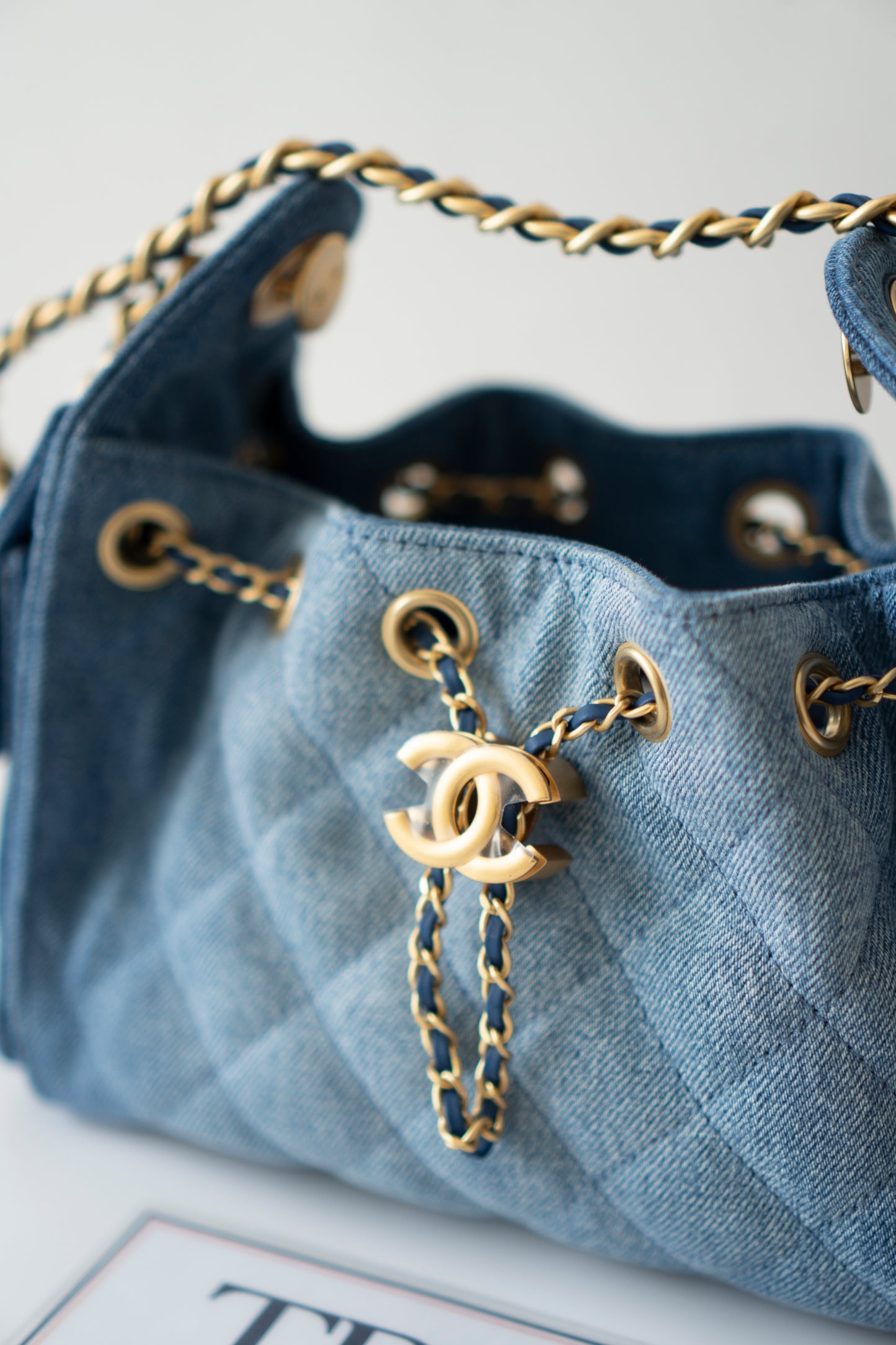 Mini Drawstring Bag – Washed Denim with Gold Hardware